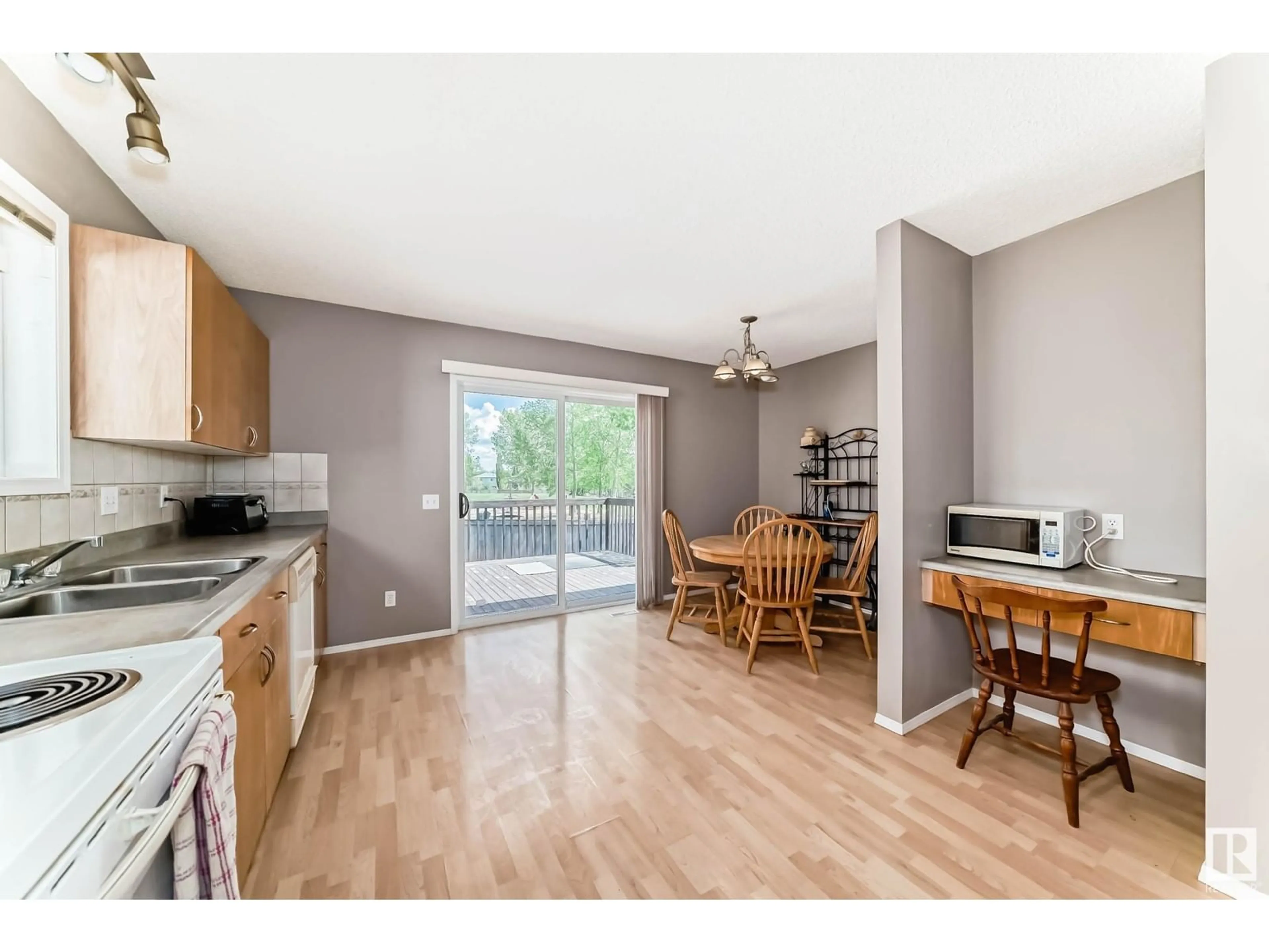 Open concept kitchen, wood/laminate floor for 188 LAKELAND DR, Spruce Grove Alberta T7X4B5