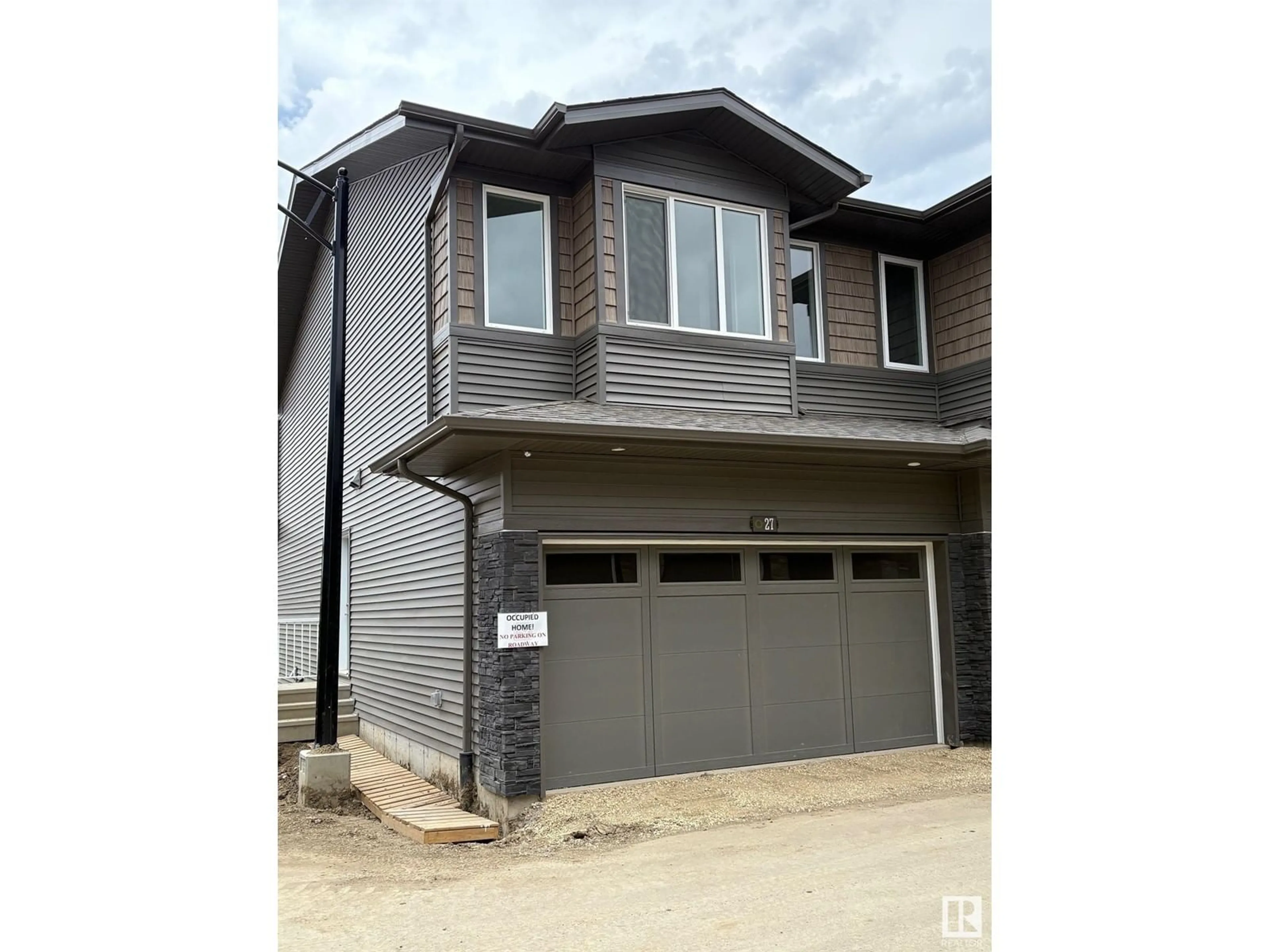 Home with vinyl exterior material, street for 27 - 2710 66 ST, Edmonton Alberta T6X3H4
