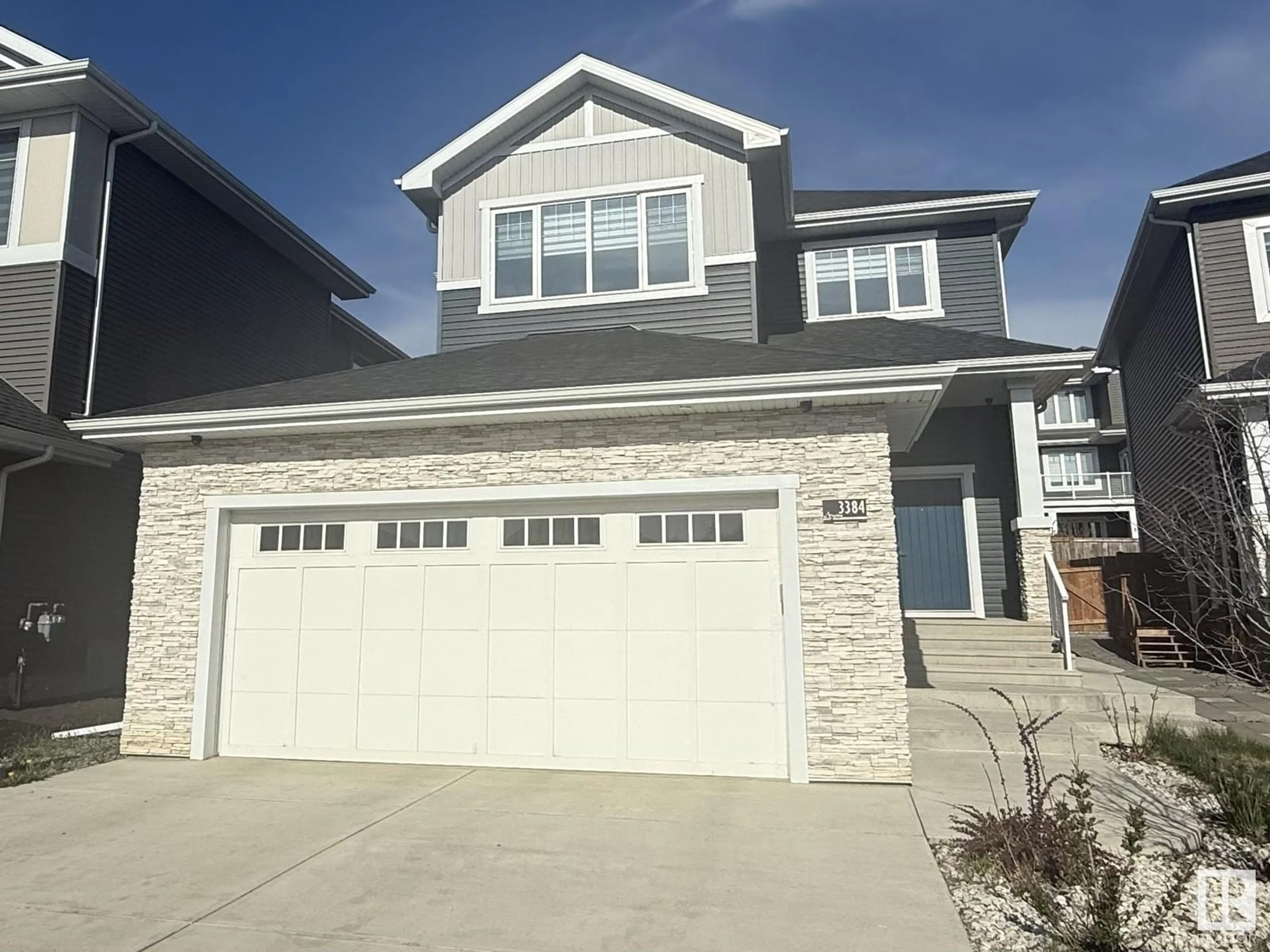 Home with vinyl exterior material, street for 3384 CHICKADEE DR, Edmonton Alberta T5S0L2