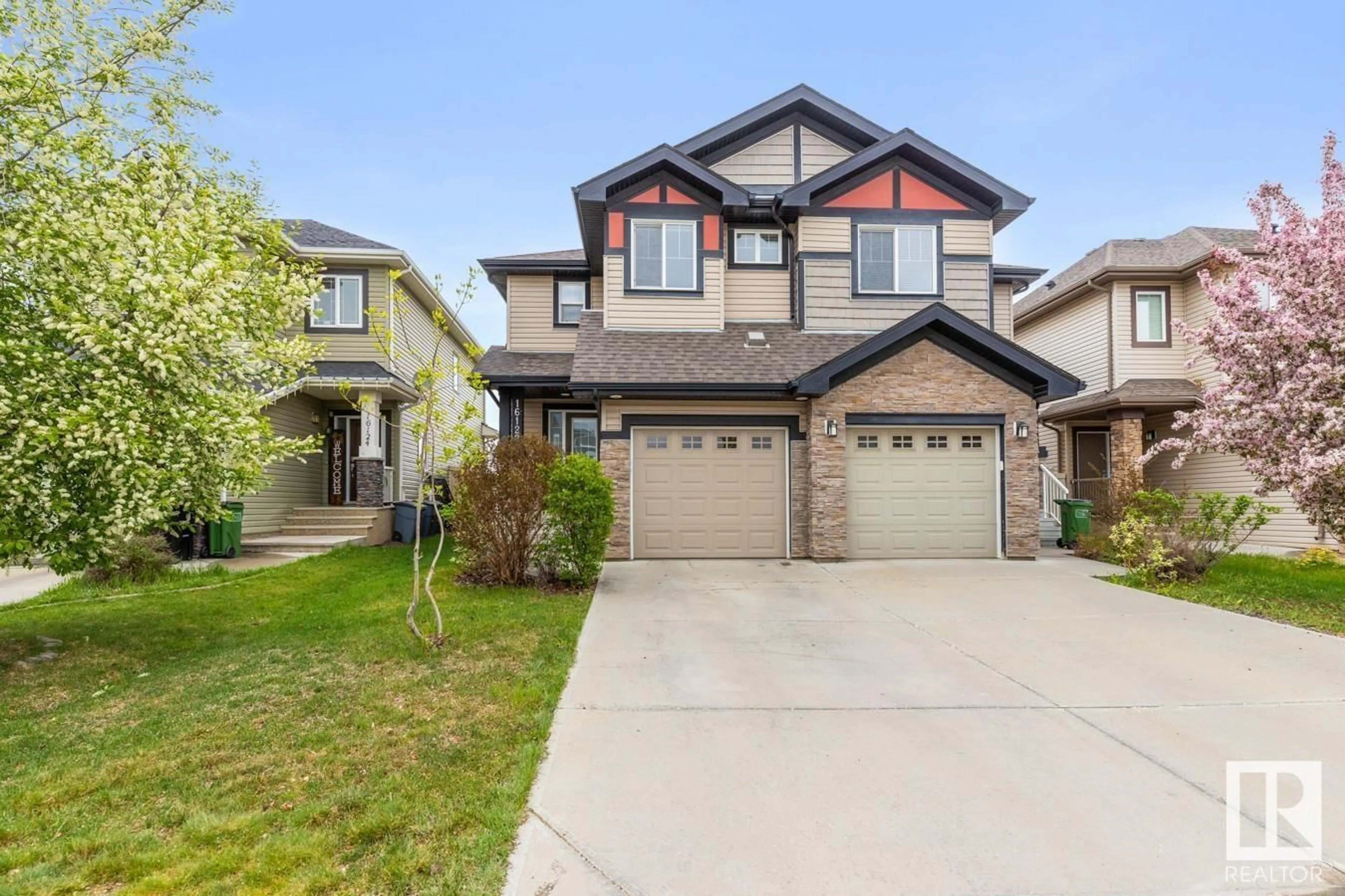 Home with vinyl exterior material, street for SW - 16122 10 AV, Edmonton Alberta T6W2G9