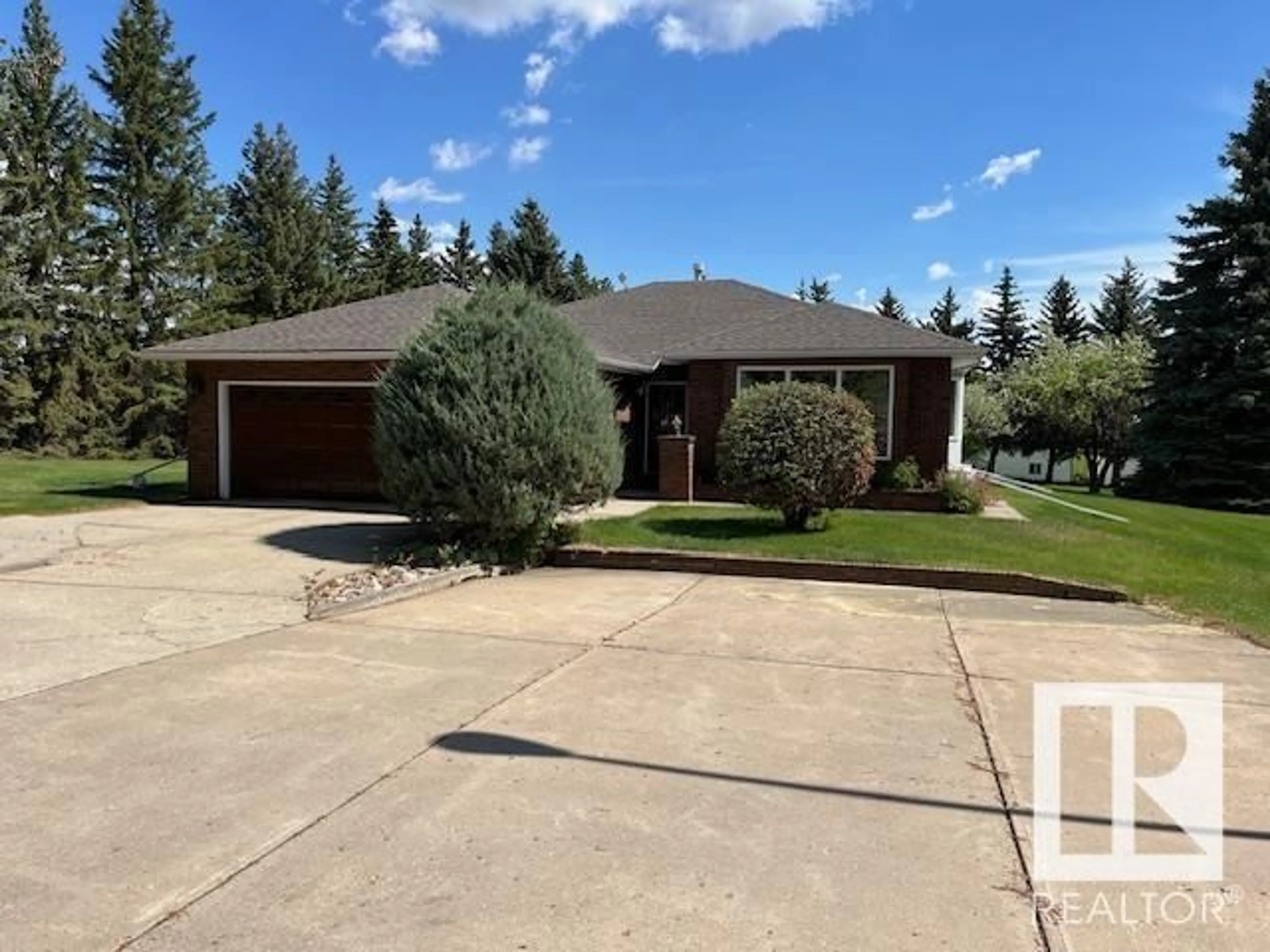 A pic from outside/outdoor area/front of a property/back of a property/a pic from drone, street for 32 24119 TWP ROAD 554, Rural Sturgeon County Alberta T8T1X7
