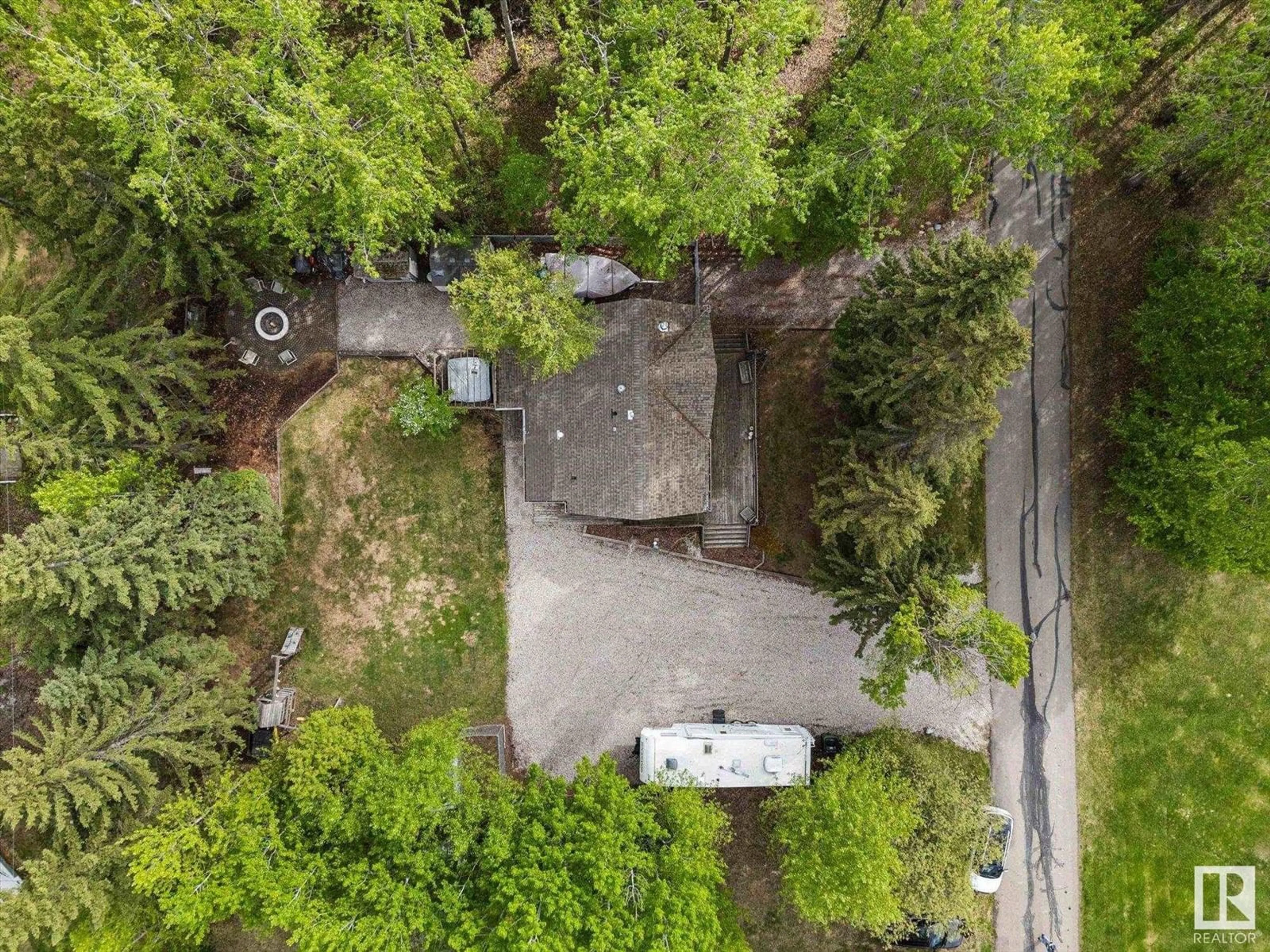 A pic from outside/outdoor area/front of a property/back of a property/a pic from drone, forest/trees view for 1028-1029 10 ST, Rural Lac Ste. Anne County Alberta T0E0A2