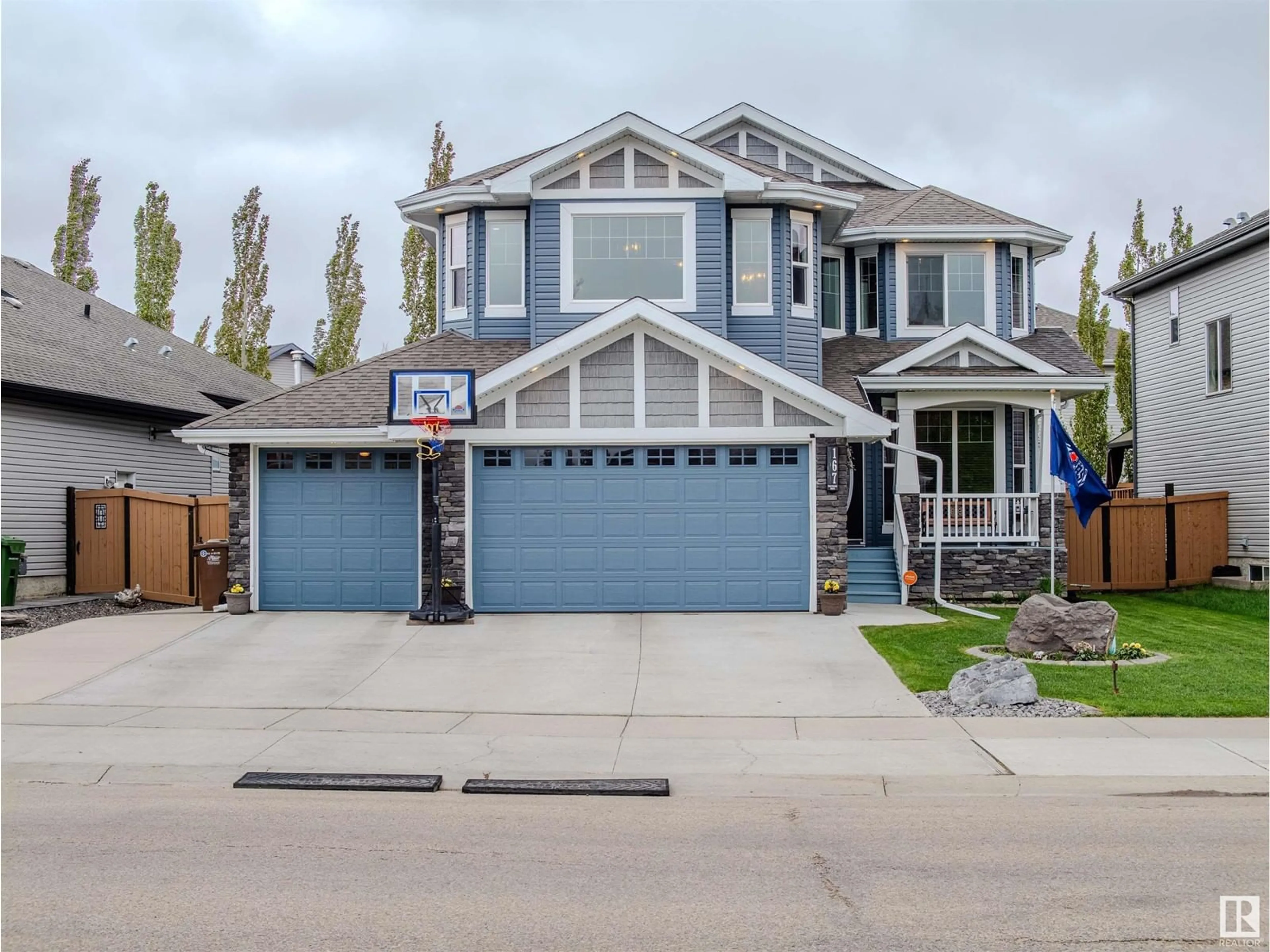 Home with vinyl exterior material, street for 167 NORTH RIDGE DR, St. Albert Alberta T8N4J2