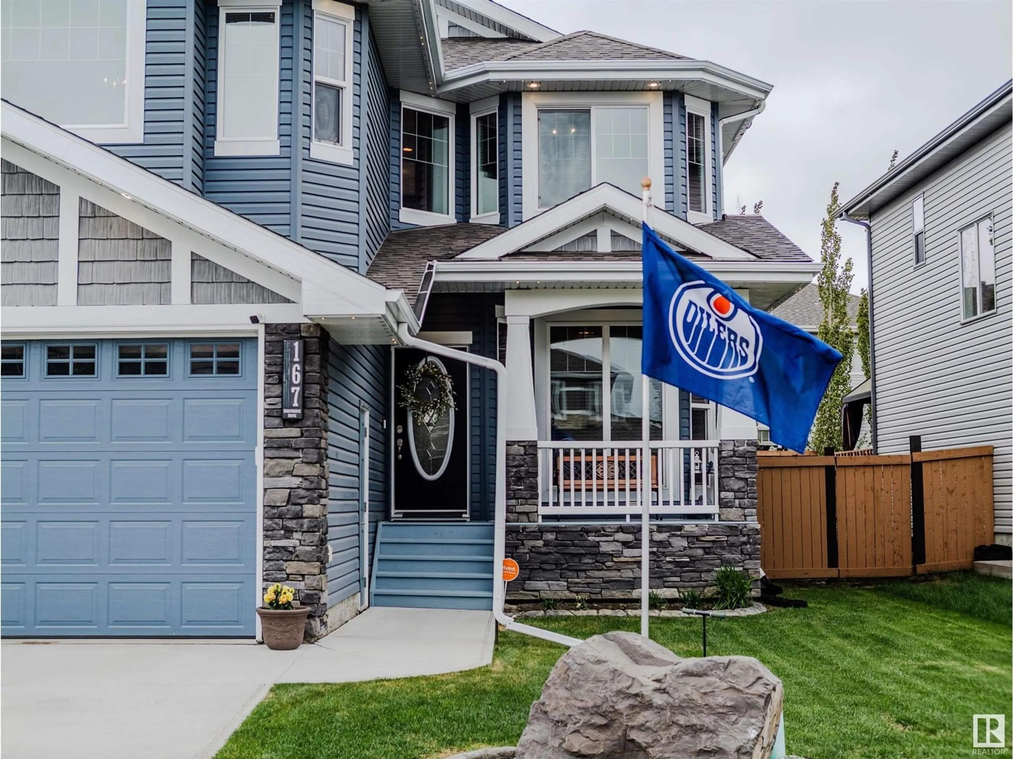 Home with vinyl exterior material, street for 167 NORTH RIDGE DR, St. Albert Alberta T8N4J2