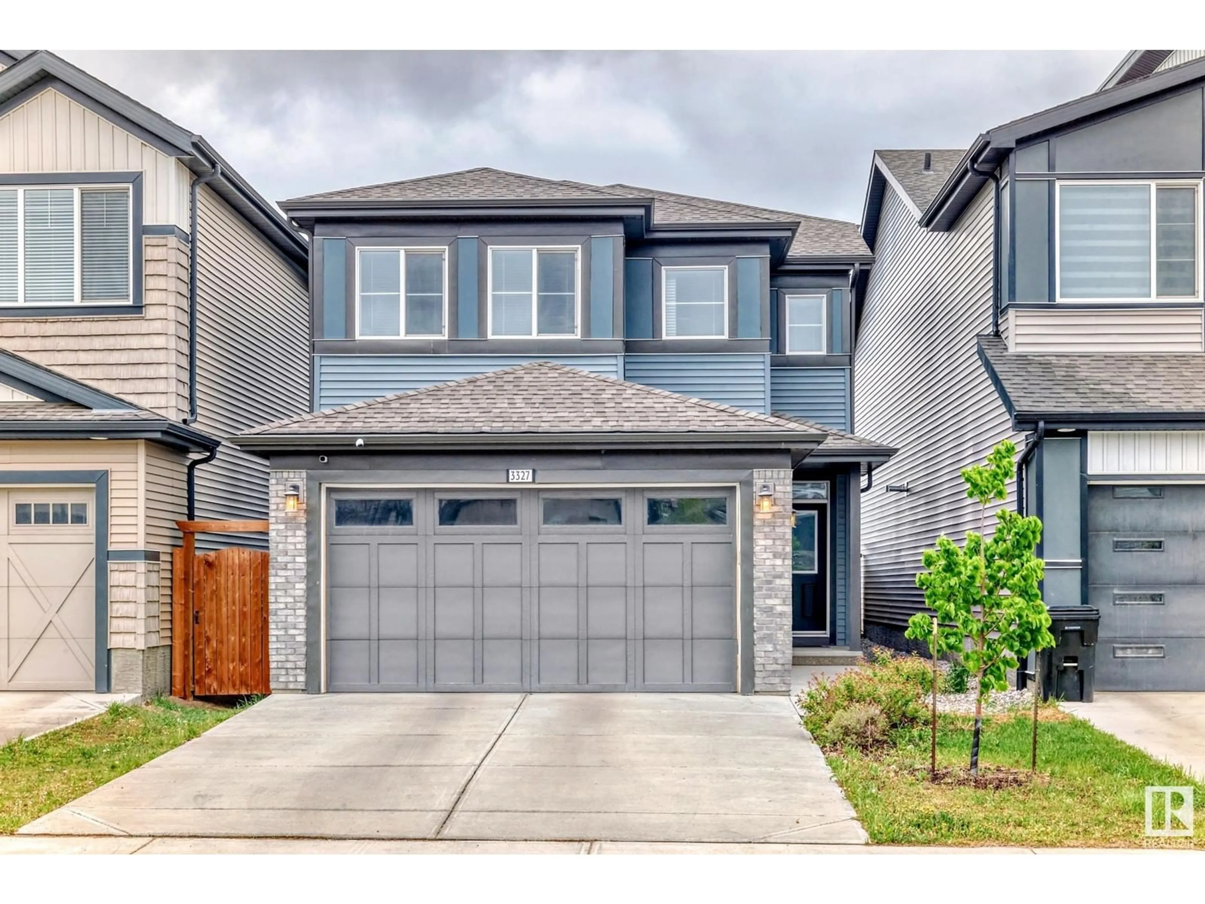 Home with vinyl exterior material, street for SW - 3327 PARKER LO, Edmonton Alberta T6W4C2