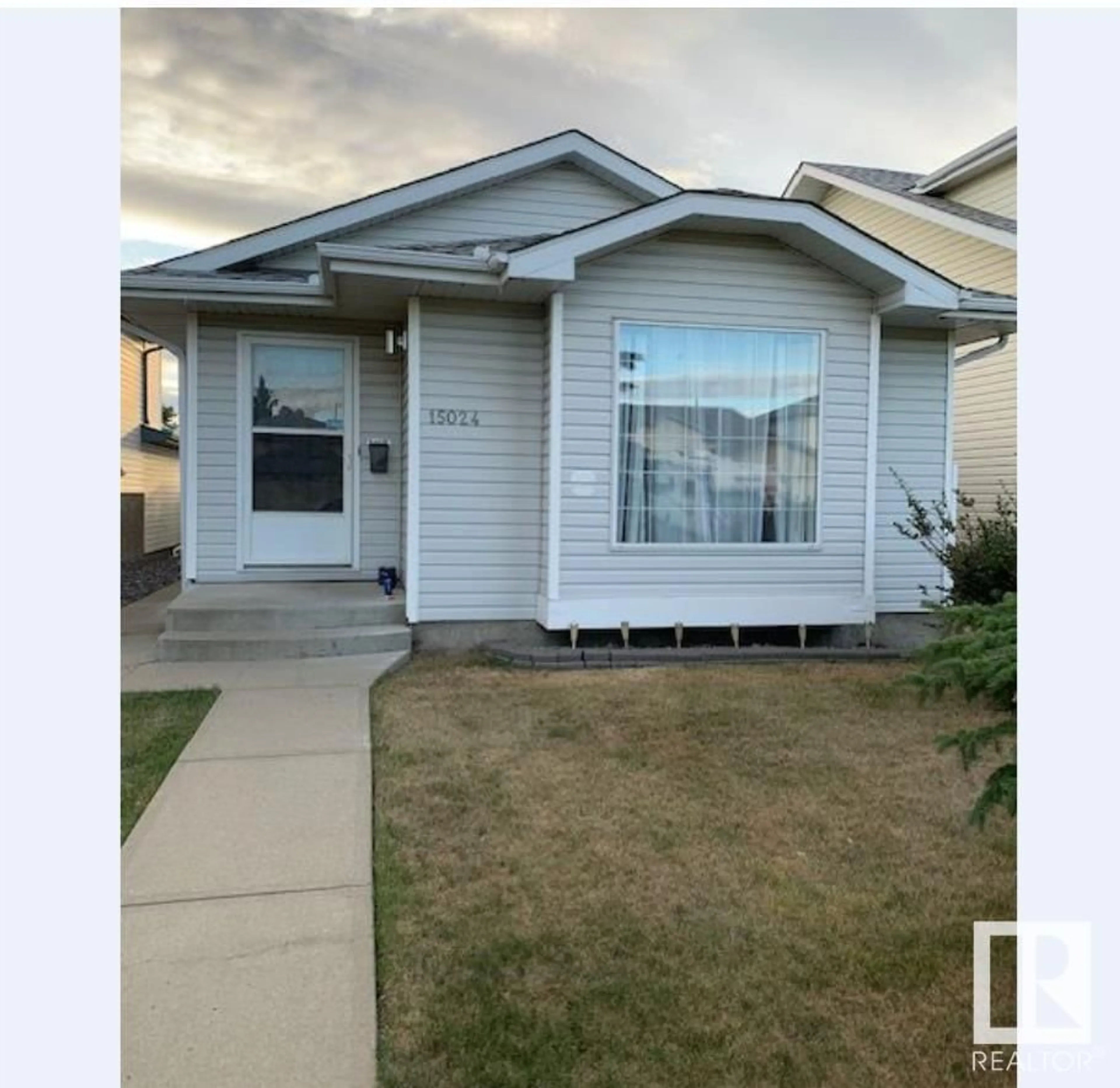 Home with vinyl exterior material, street for NW - 15024 128 ST, Edmonton Alberta T6V1E9