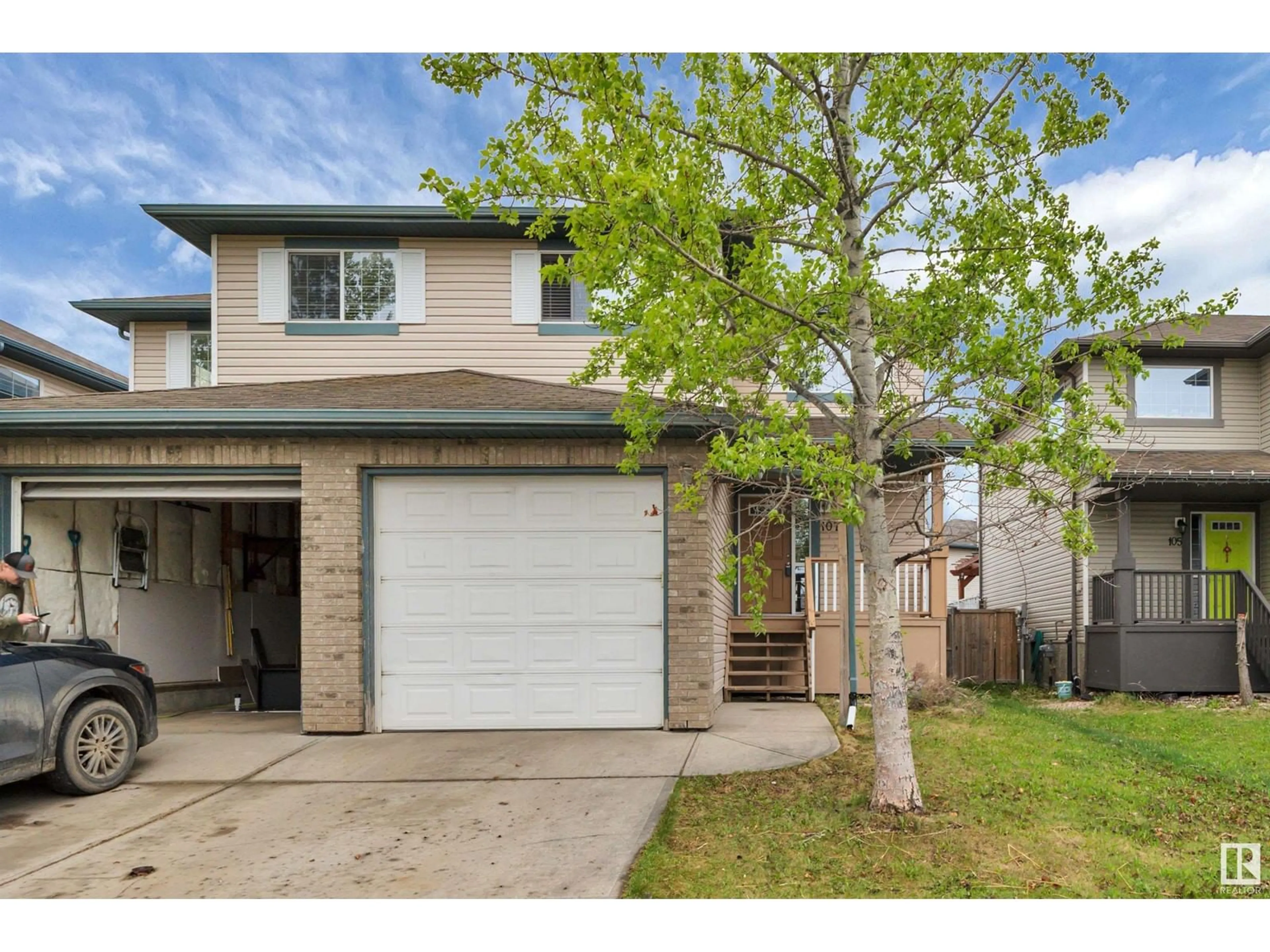 Home with vinyl exterior material, street for 107 DOUGLAS LN, Leduc Alberta T9E0E4