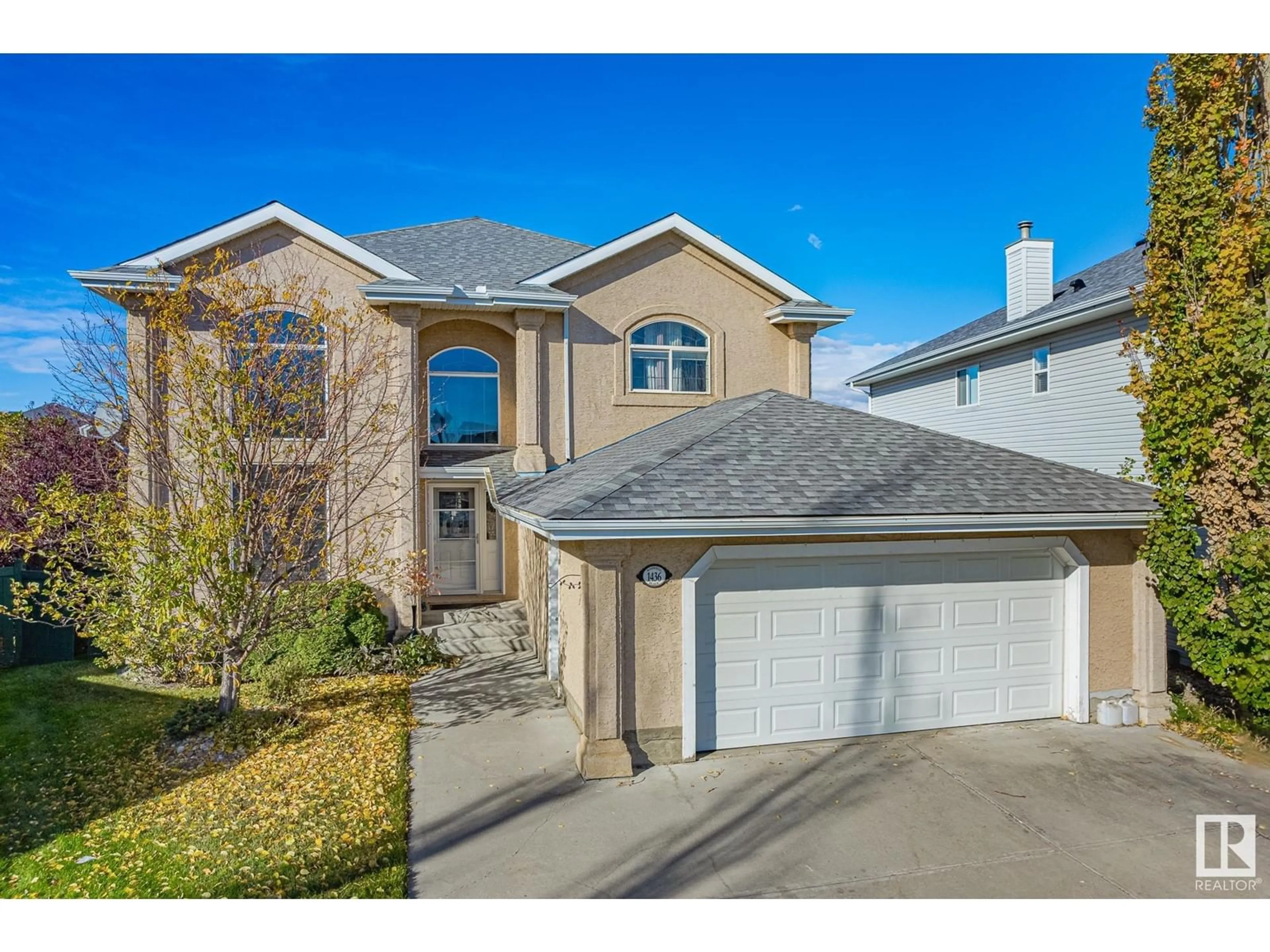 Home with vinyl exterior material, street for 1436 HASWELL PL, Edmonton Alberta T6R3E1
