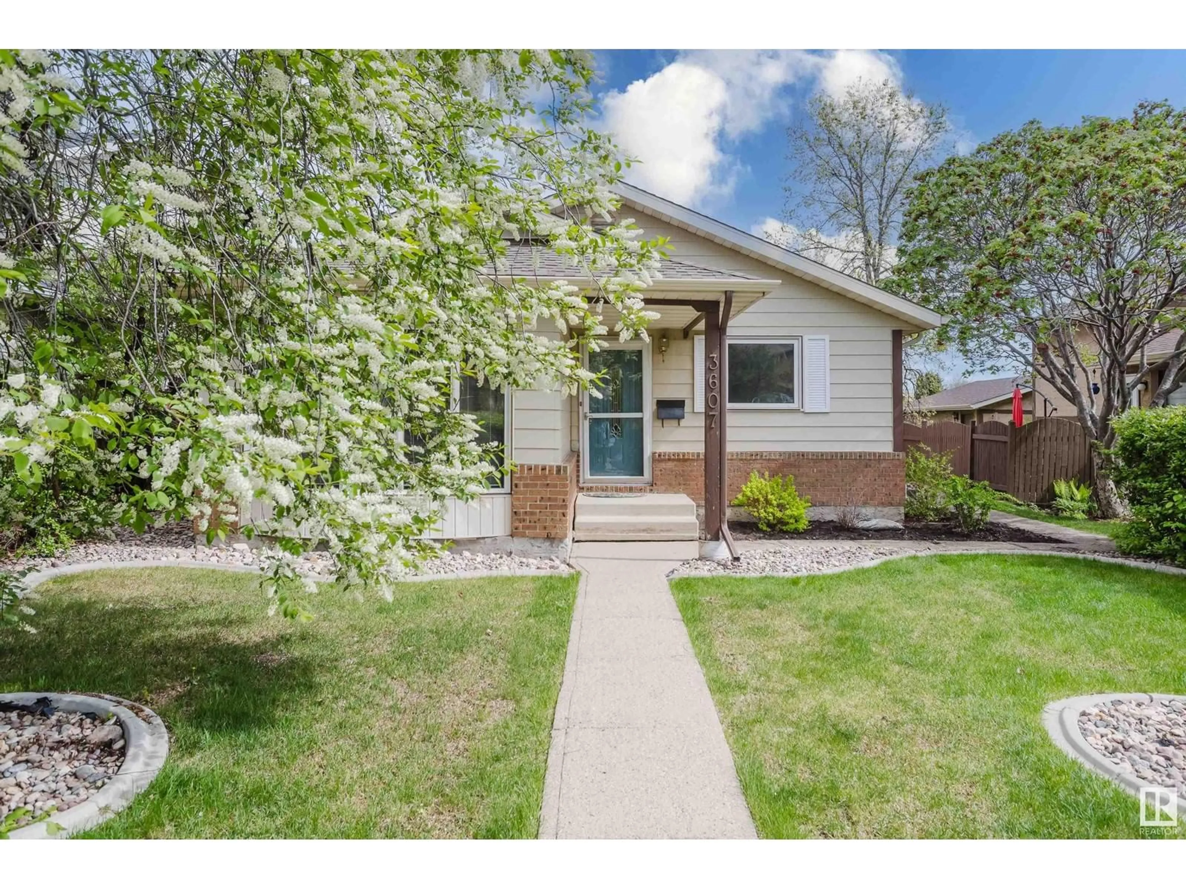 Home with brick exterior material, street for NW - 3607 56 ST, Edmonton Alberta T6L2J6