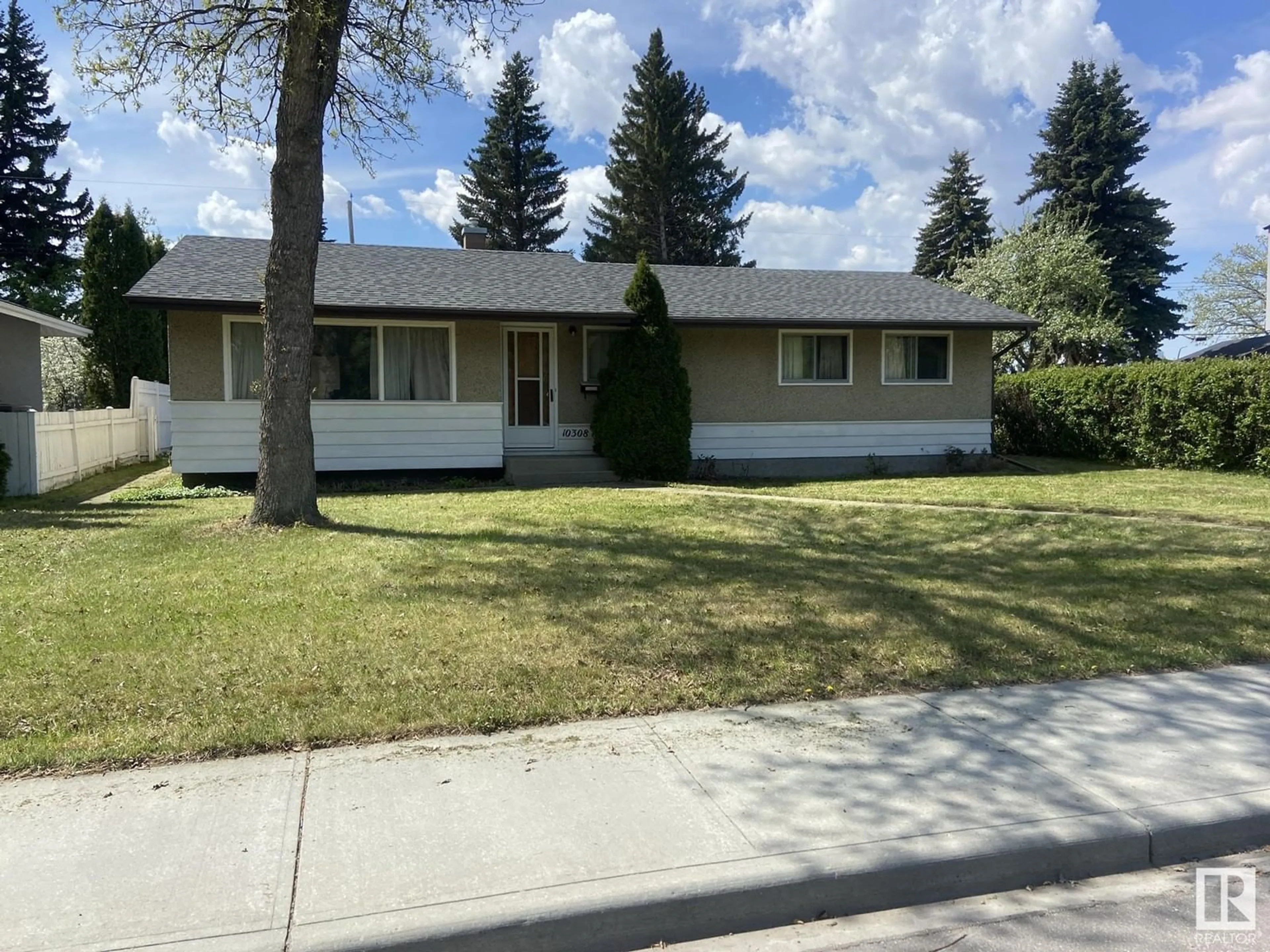 Home with vinyl exterior material, street for NW - 10308 70 ST, Edmonton Alberta T6A2T6