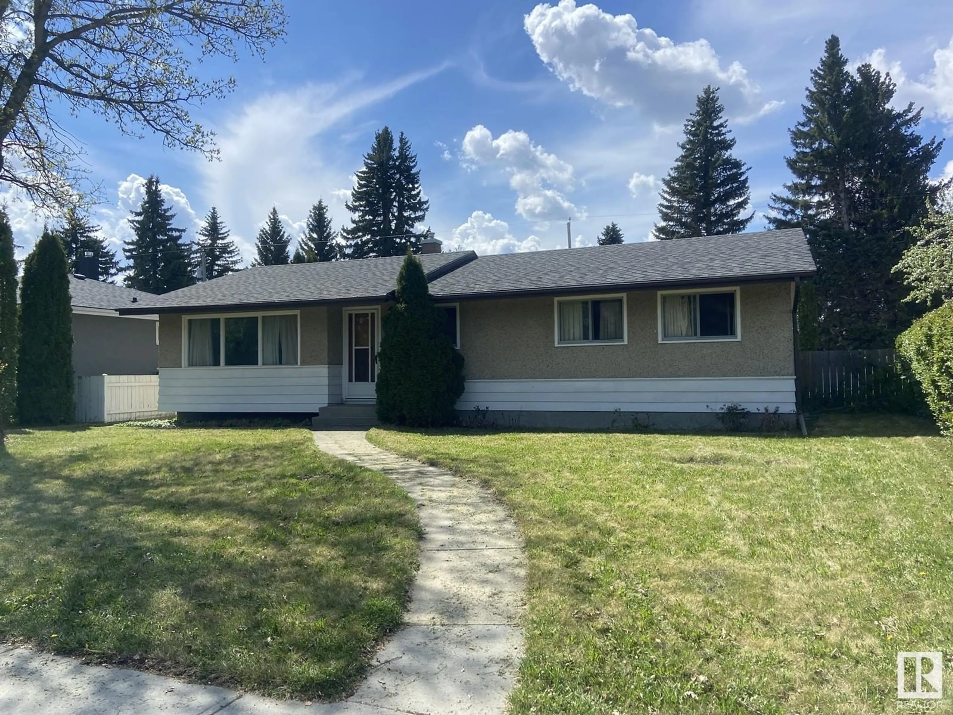 Home with vinyl exterior material, street for NW - 10308 70 ST, Edmonton Alberta T6A2T6