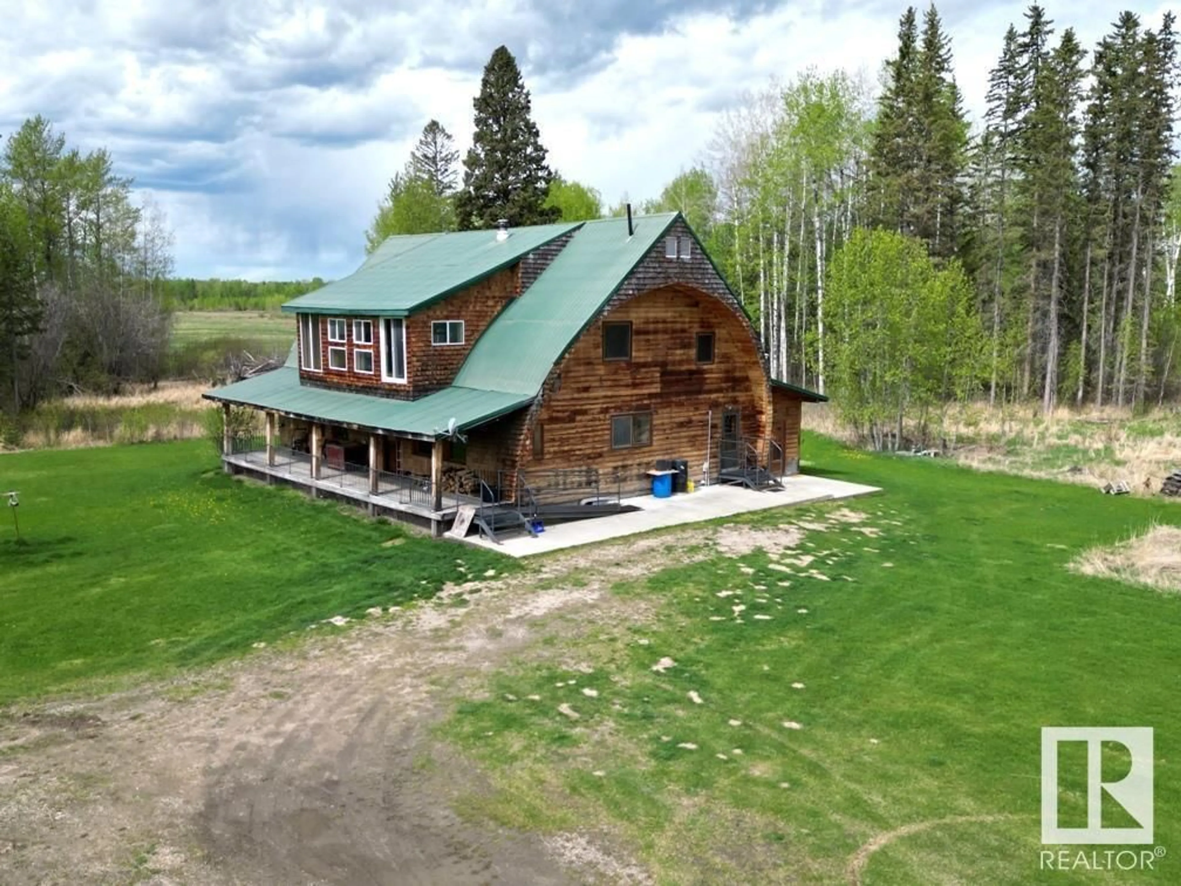 A pic from outside/outdoor area/front of a property/back of a property/a pic from drone, building for 48216 RGE ROAD 72, Rural Brazeau County Alberta T0C0S0