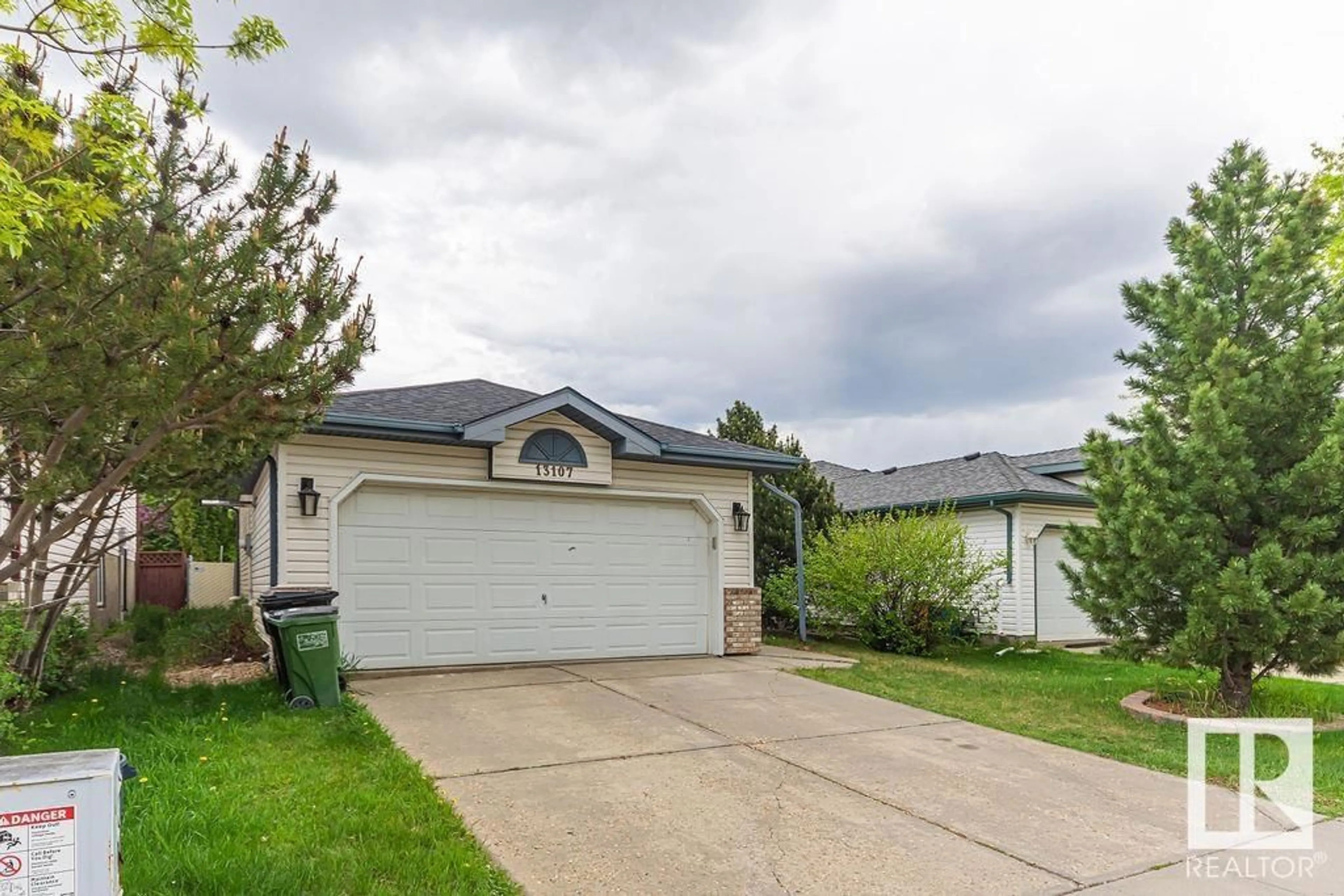 Home with vinyl exterior material, street for 13107 36 ST, Edmonton Alberta T5A5C7