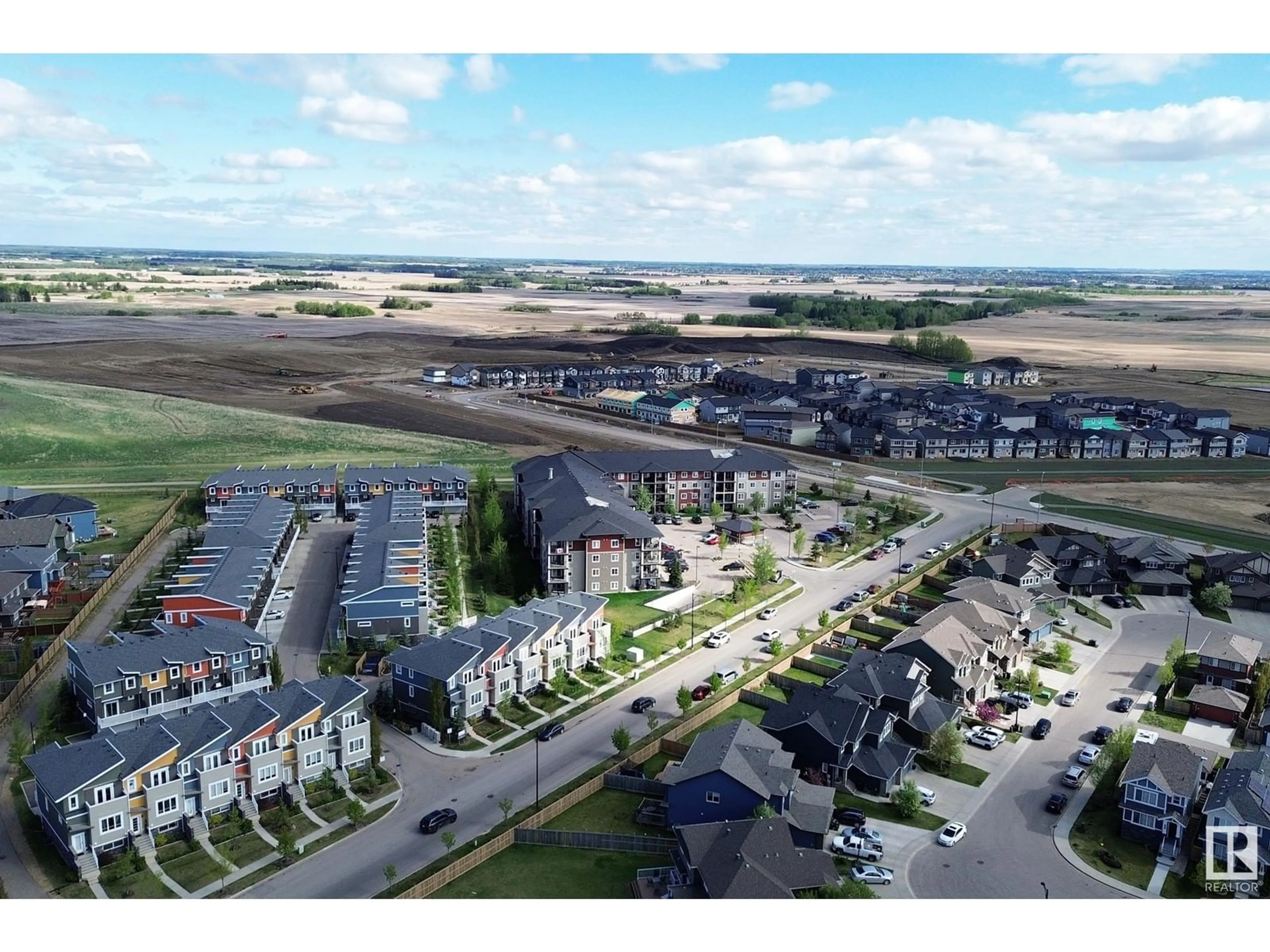 A pic from outside/outdoor area/front of a property/back of a property/a pic from drone, mountain view for #224 - 1510 WATT DR, Edmonton Alberta T6X2E6