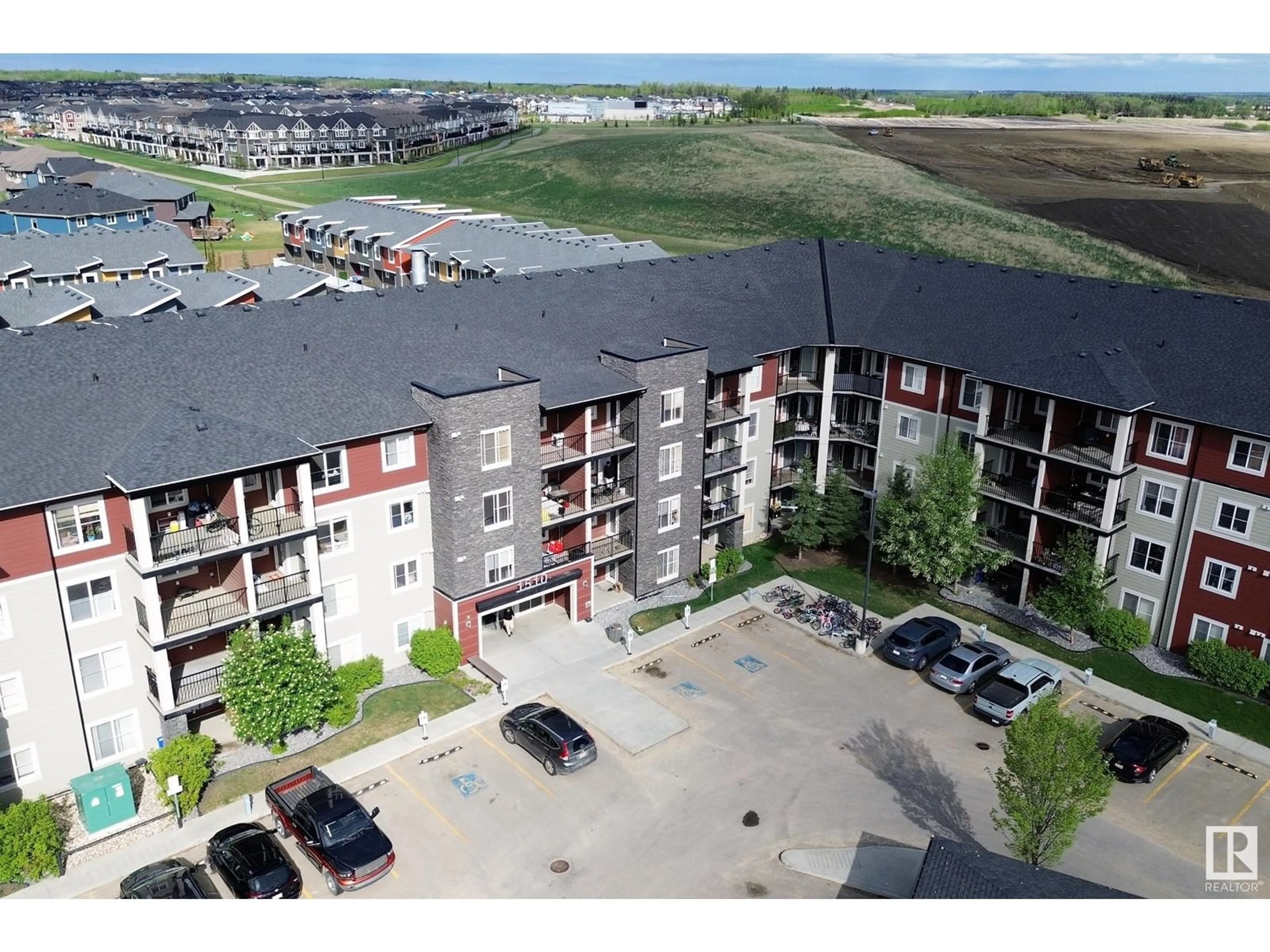 A pic from outside/outdoor area/front of a property/back of a property/a pic from drone, unknown for #224 - 1510 WATT DR, Edmonton Alberta T6X2E6