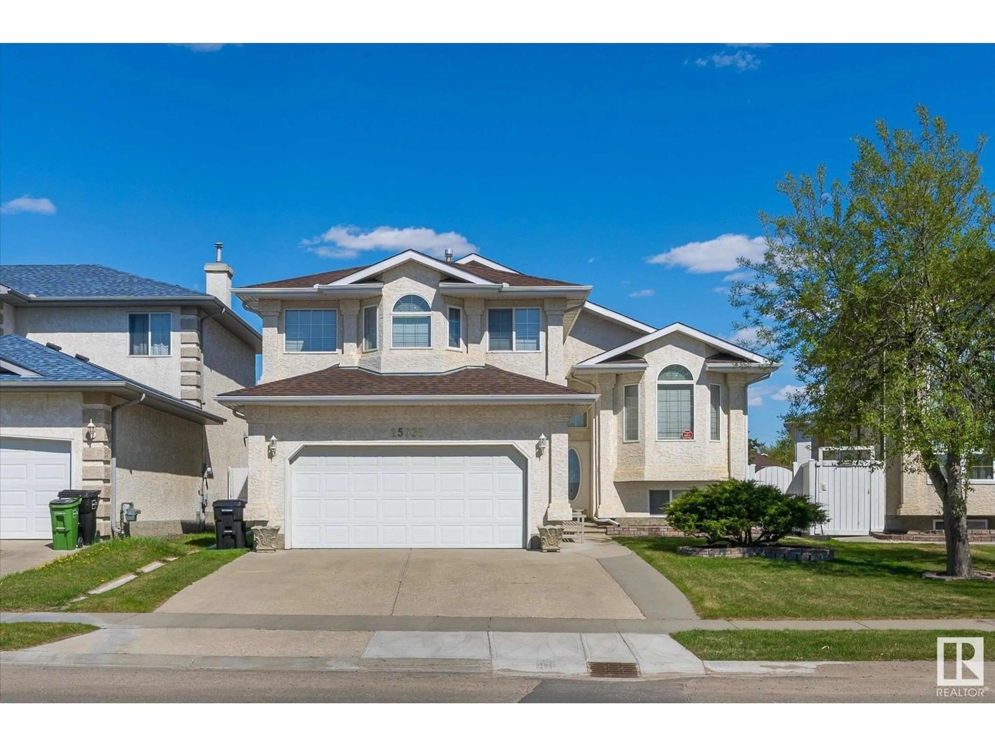 Home with vinyl exterior material, street for 15939 88 ST, Edmonton Alberta T5Z3B7