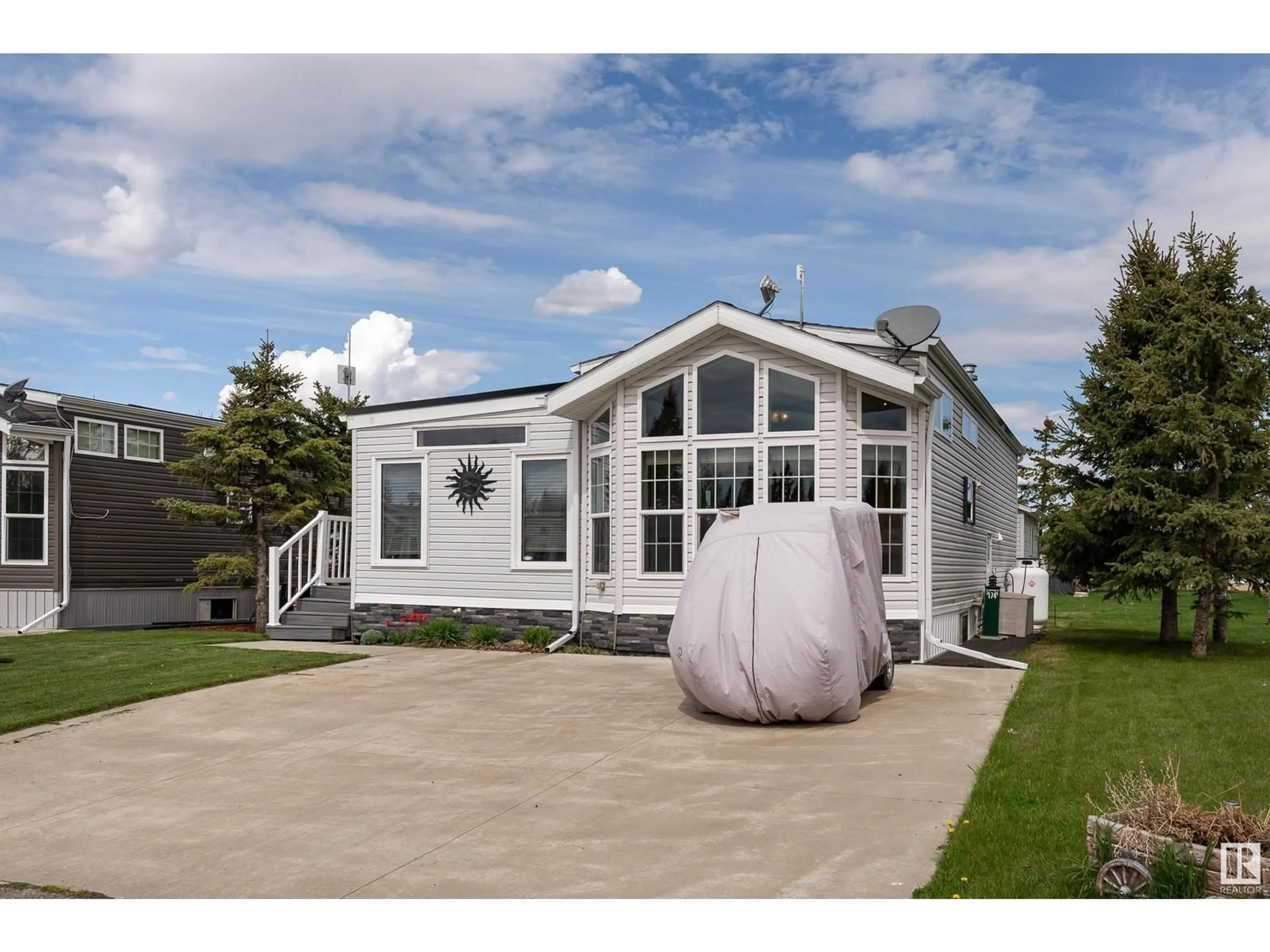 Home with vinyl exterior material, street for 174 RGE ROAD 70, Rural Parkland County Alberta T0E0S0