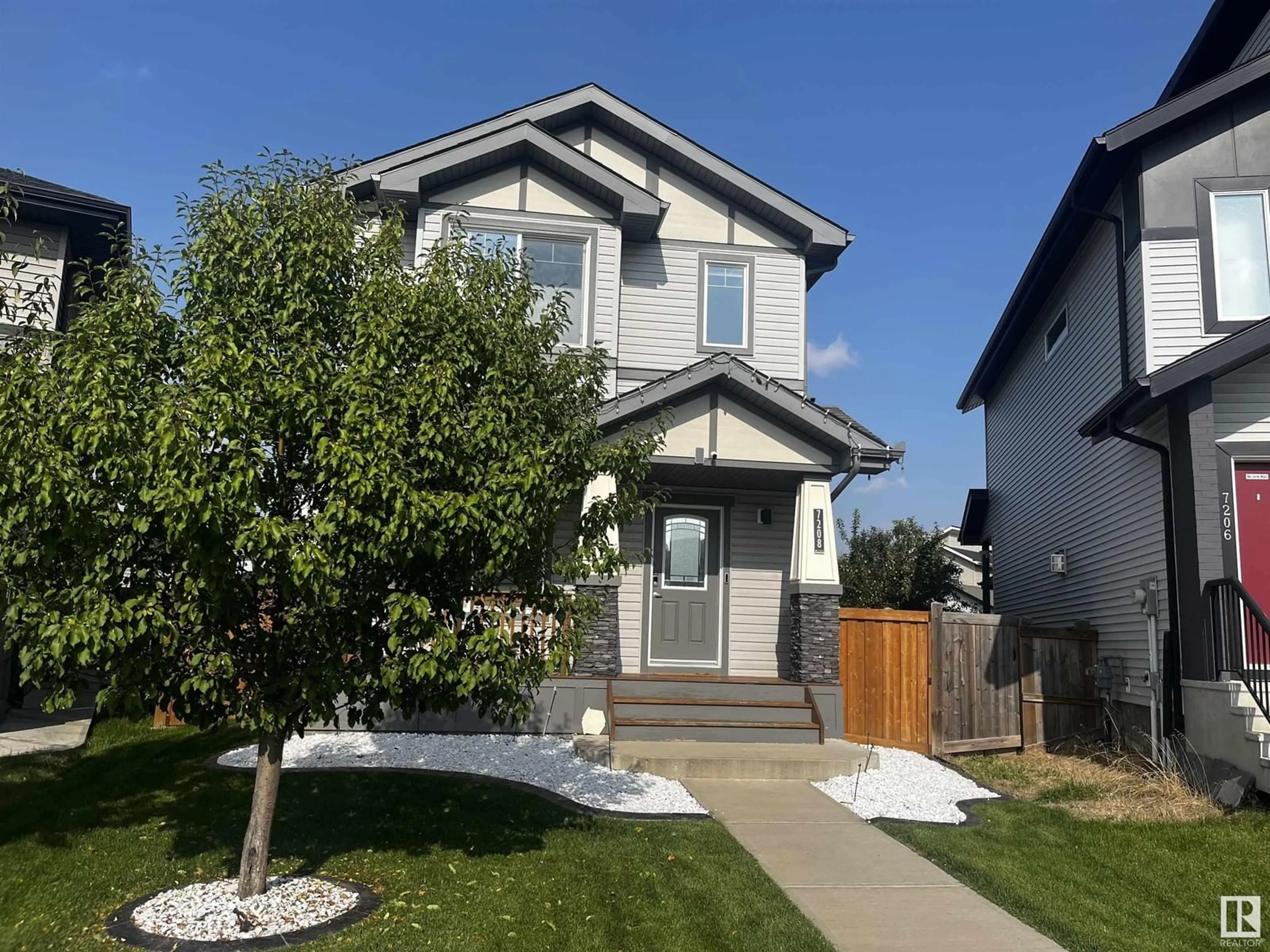 Home with vinyl exterior material, street for 7208 CARDINAL WY, Edmonton Alberta T6W2Y5