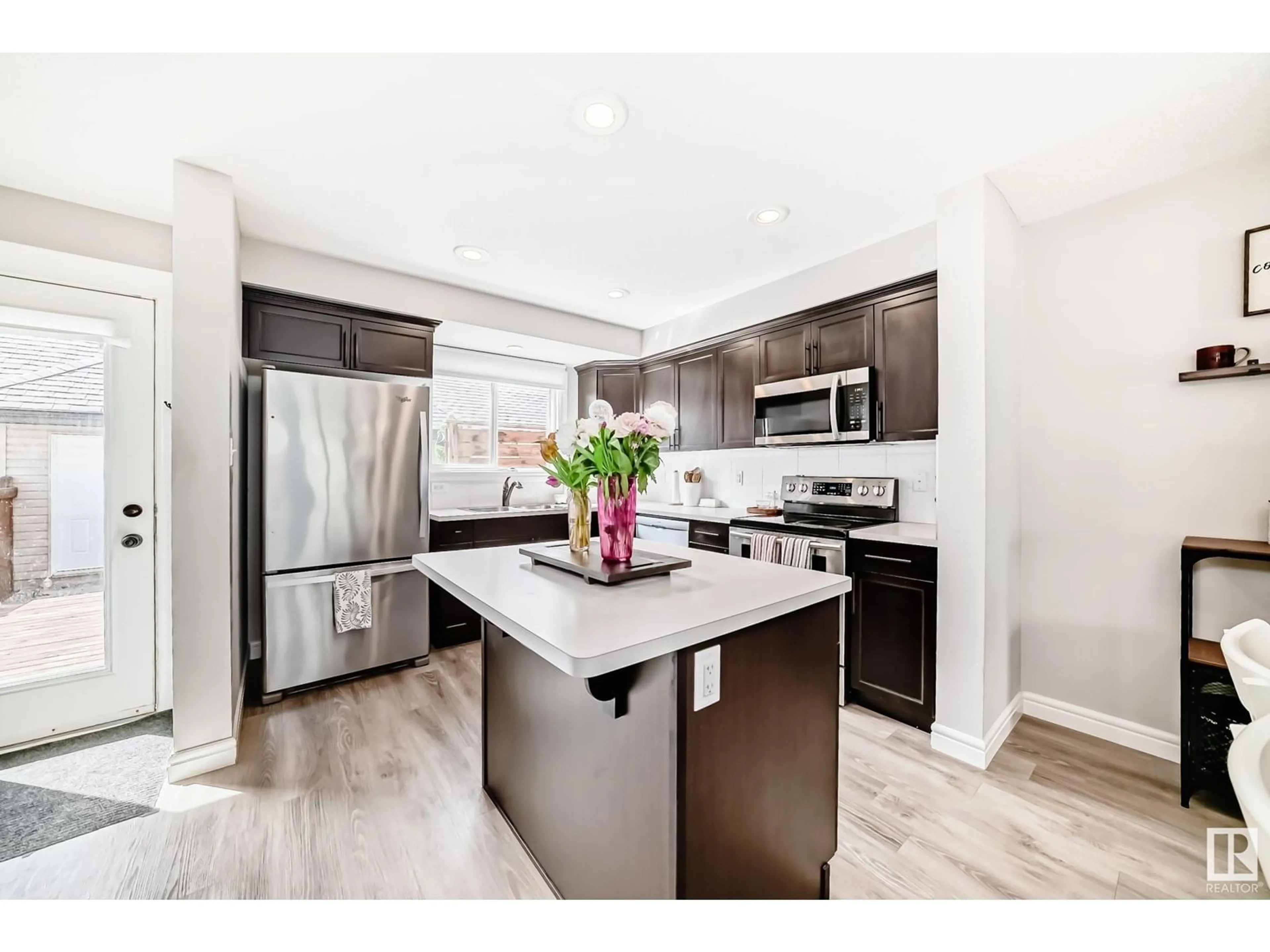 Open concept kitchen, unknown for 2181 TRUMPETER WY, Edmonton Alberta T5S0K2