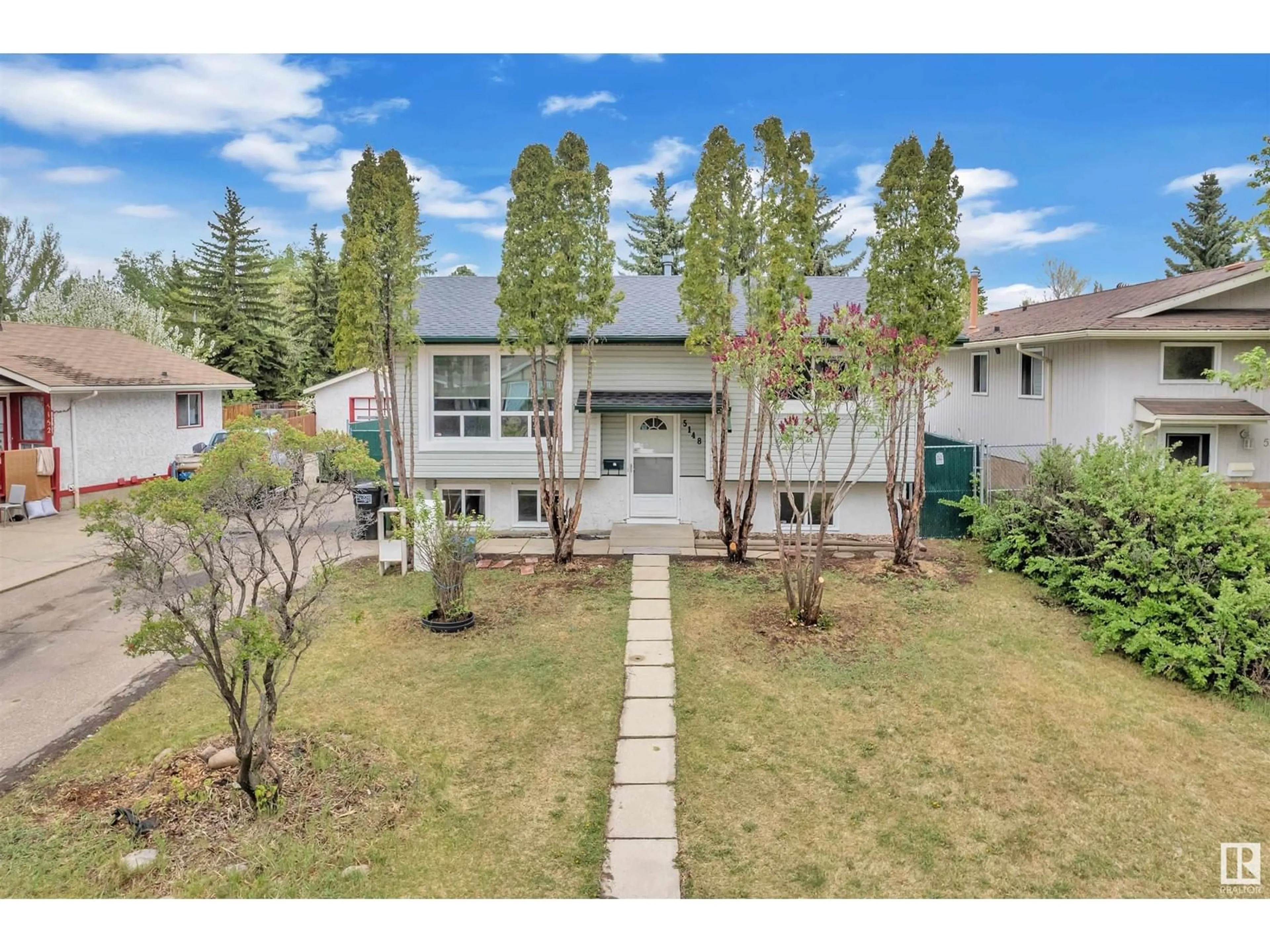 A pic from outside/outdoor area/front of a property/back of a property/a pic from drone, street for 5148 37 AV, Edmonton Alberta T6L1C8