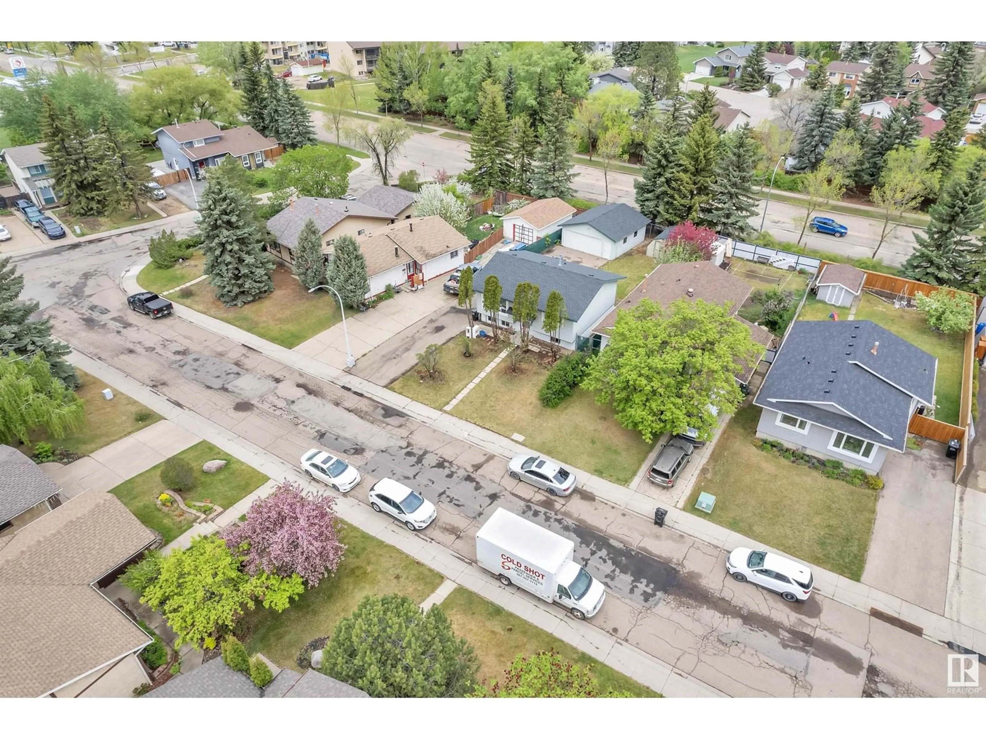 A pic from outside/outdoor area/front of a property/back of a property/a pic from drone, street for 5148 37 AV, Edmonton Alberta T6L1C8