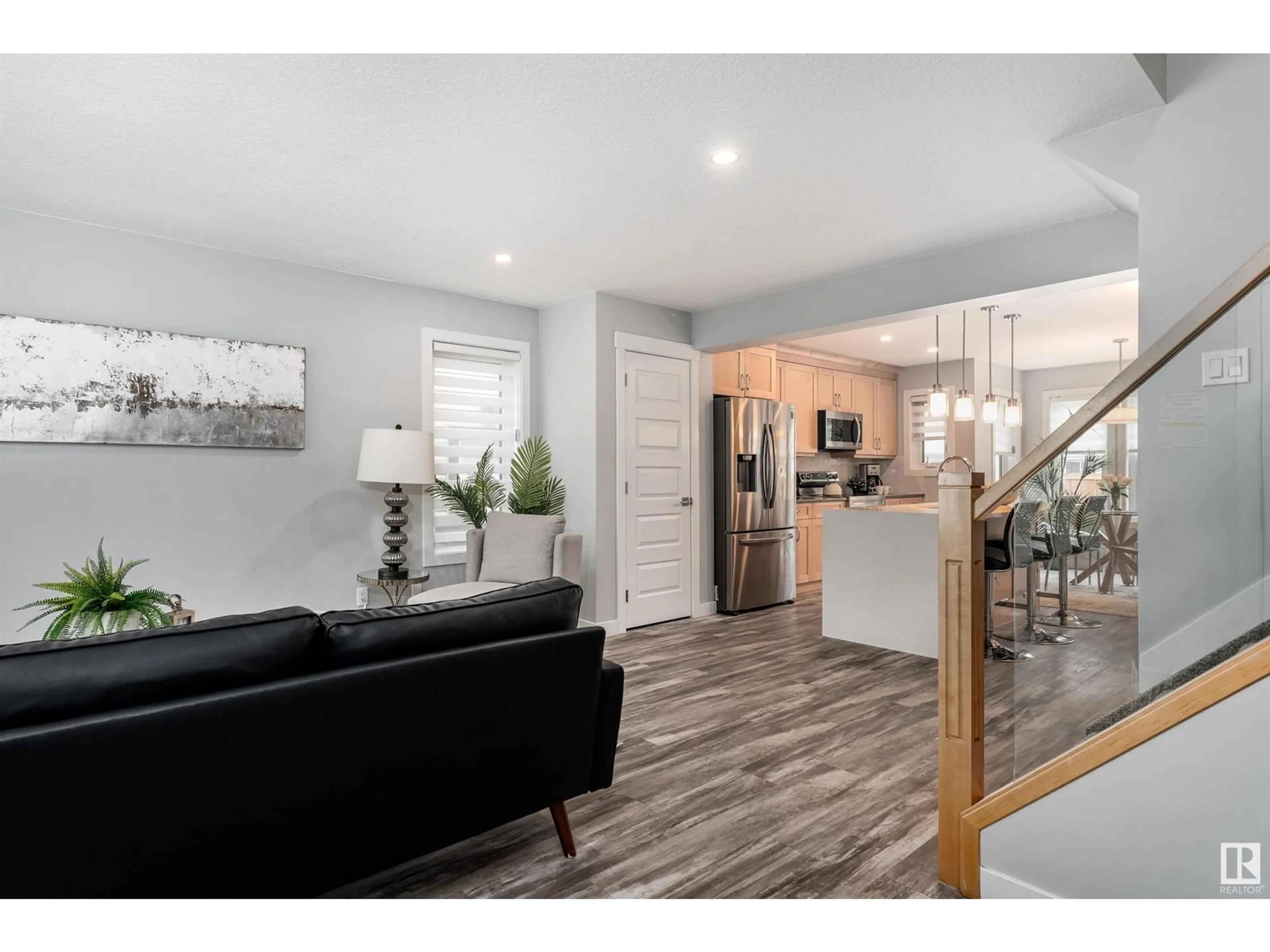 Open concept kitchen, wood/laminate floor for #2 - 12929 69 ST, Edmonton Alberta T5C0H3