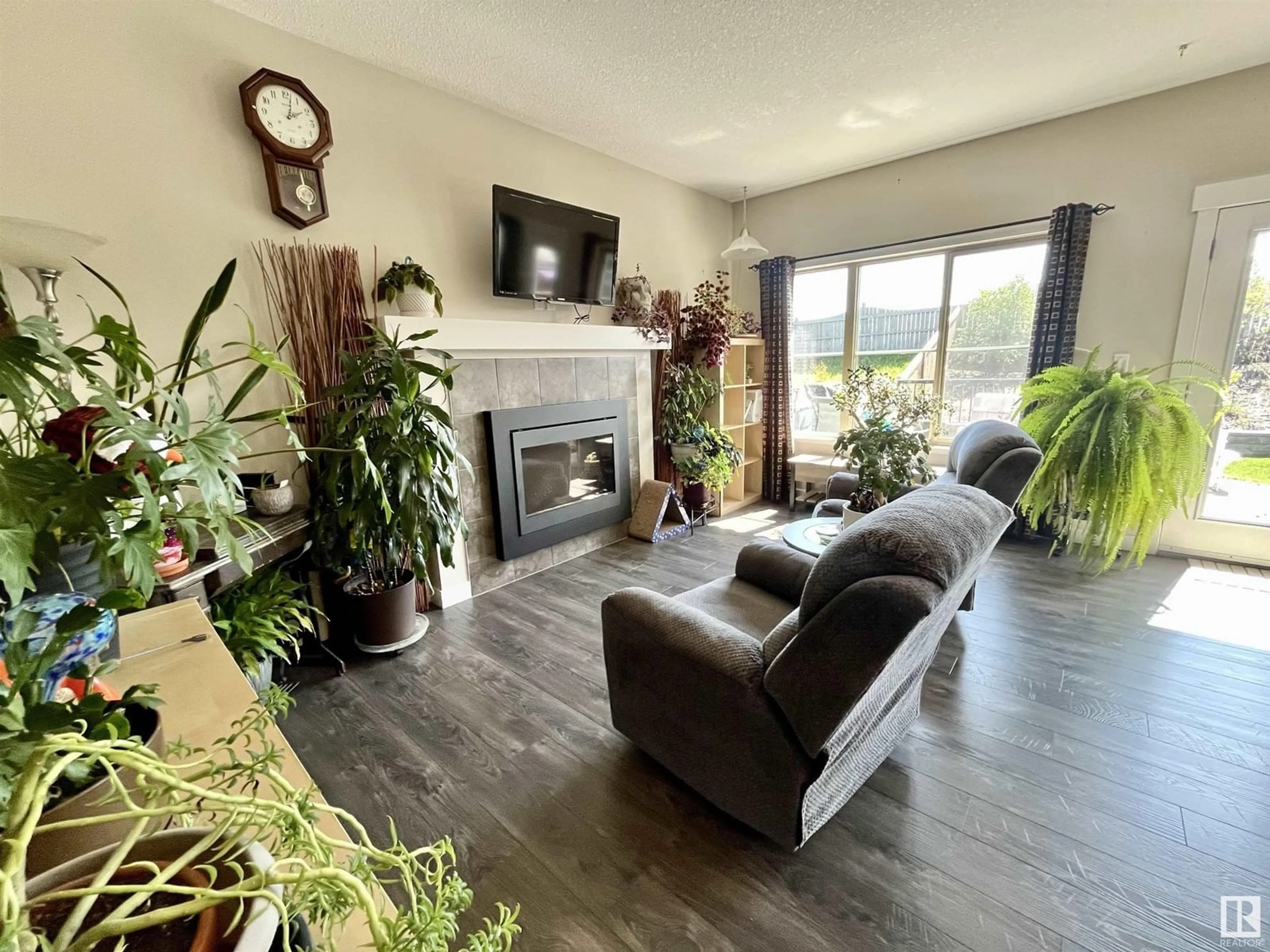 Living room with furniture, wood/laminate floor for 27 GREENBURY CL, Spruce Grove Alberta T7X0L7
