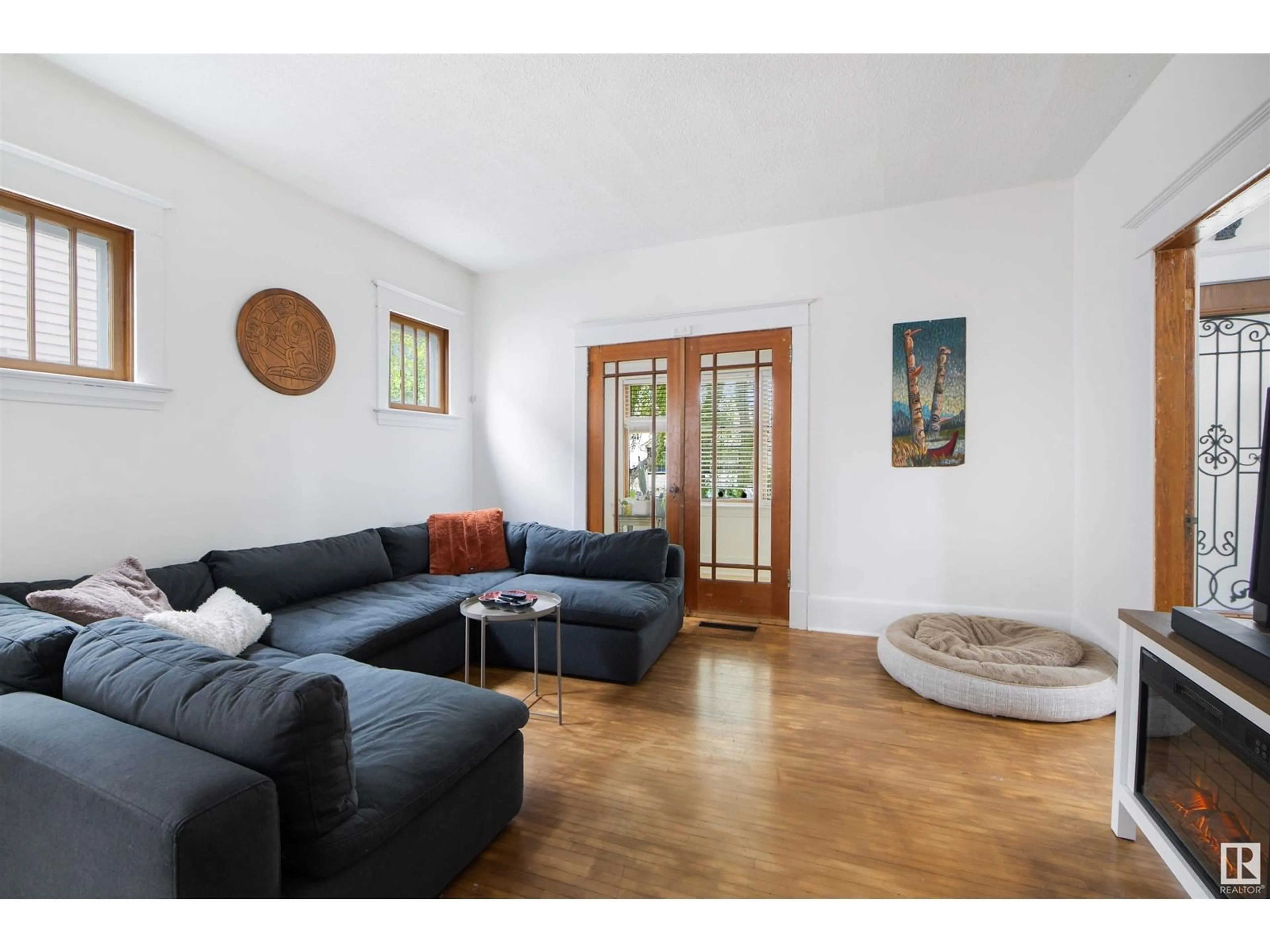 Living room with furniture, unknown for 11325 96 ST, Edmonton Alberta T5G1T2