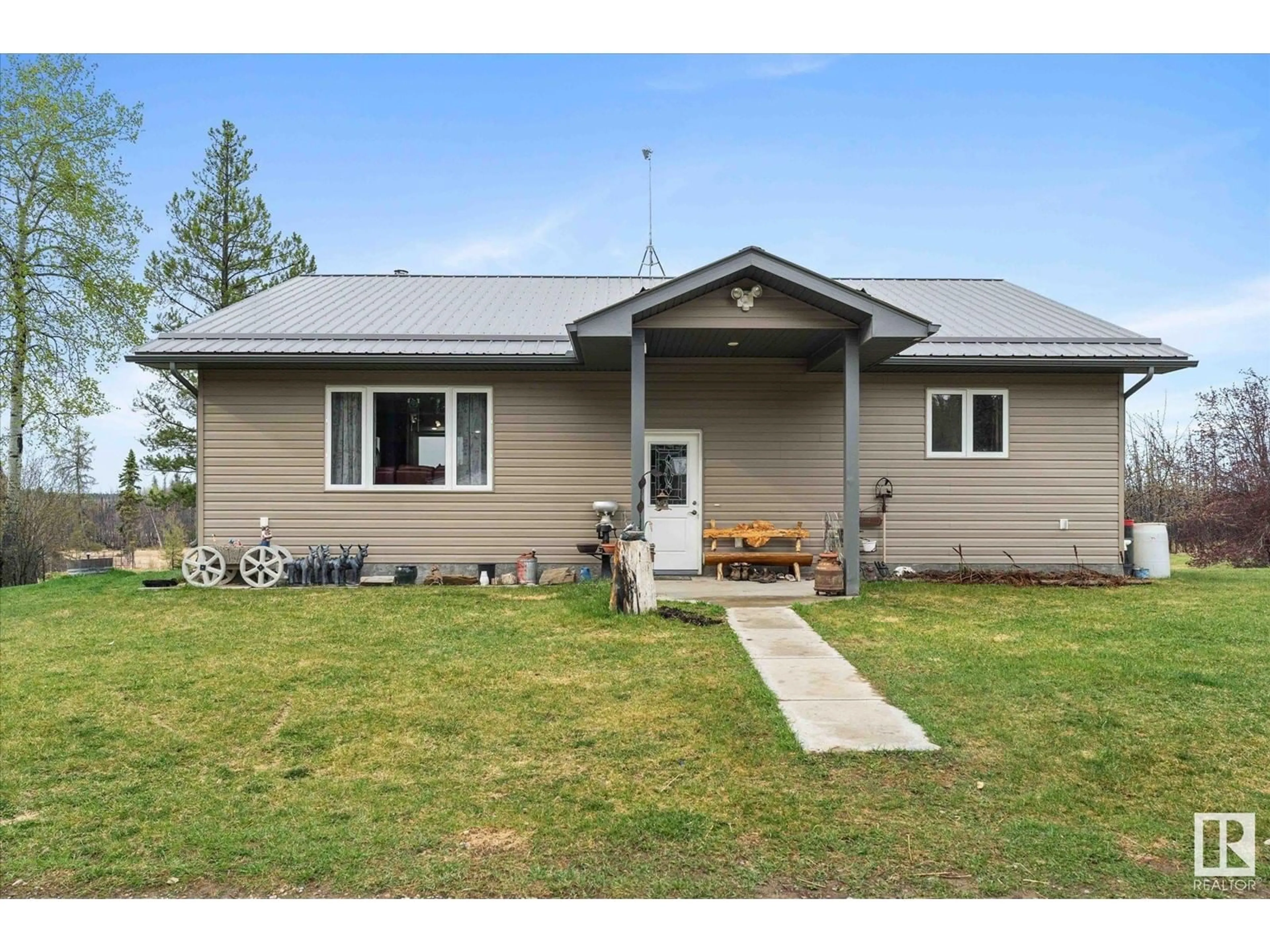 Home with vinyl exterior material, street for 123 - 55310 RRD, Rural Yellowhead Alberta T0E1S0