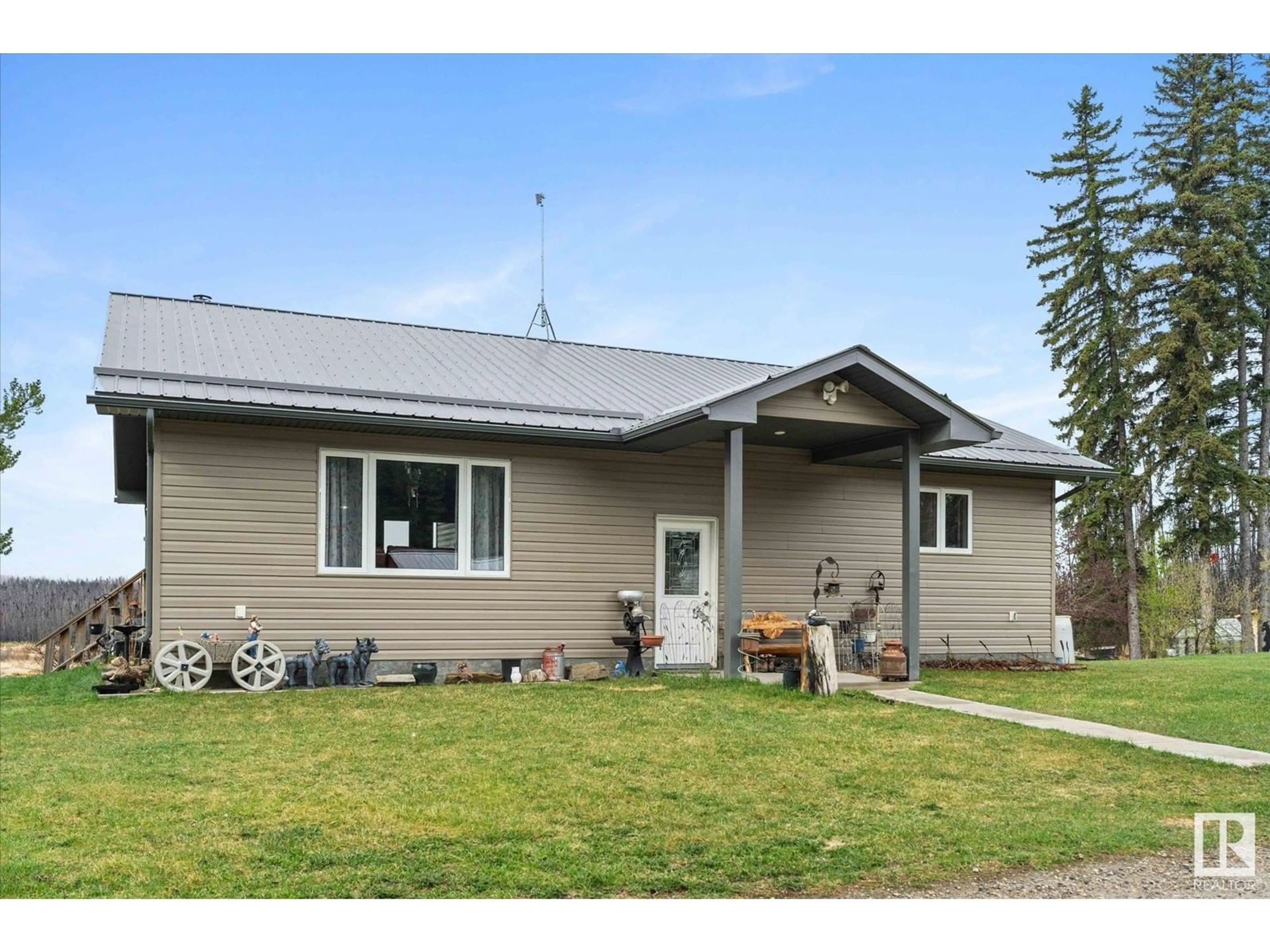 Home with vinyl exterior material, street for 123 - 55310 RRD, Rural Yellowhead Alberta T0E1S0