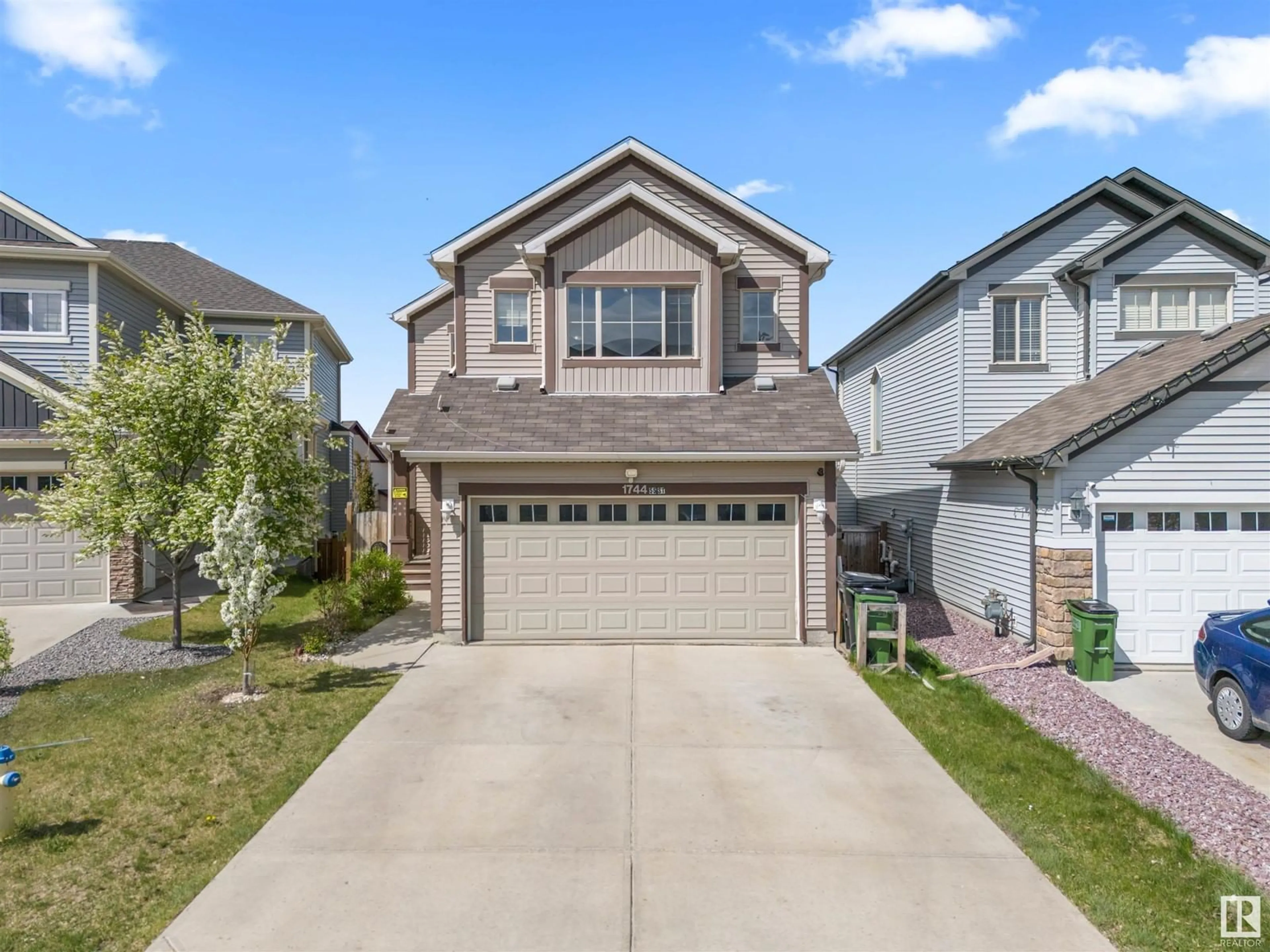 Home with vinyl exterior material, street for SW - 1744 55 STREET, Edmonton Alberta T6X1R3