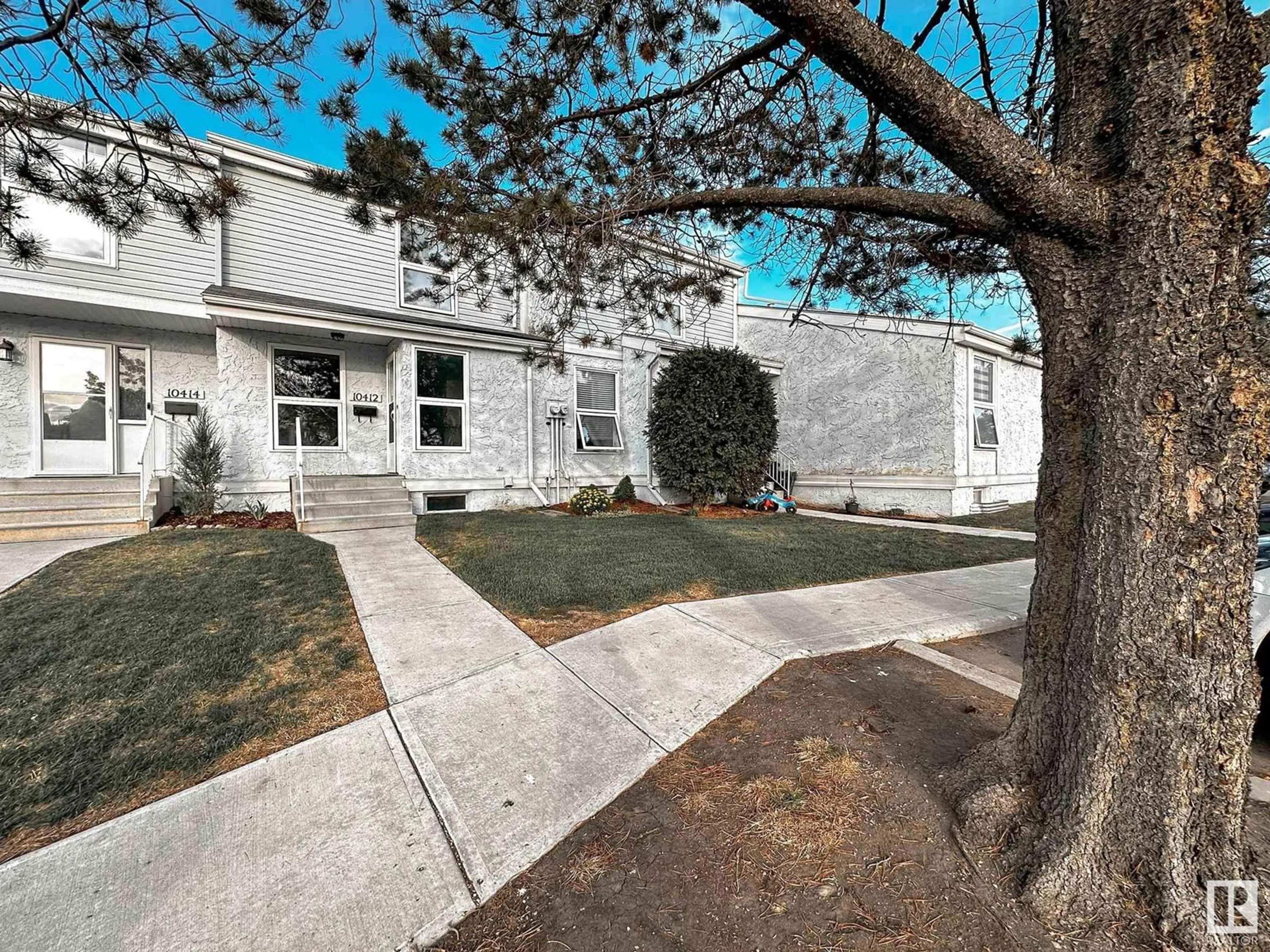 A pic from outside/outdoor area/front of a property/back of a property/a pic from drone, street for 10412 28A AV, Edmonton Alberta T6J4J6