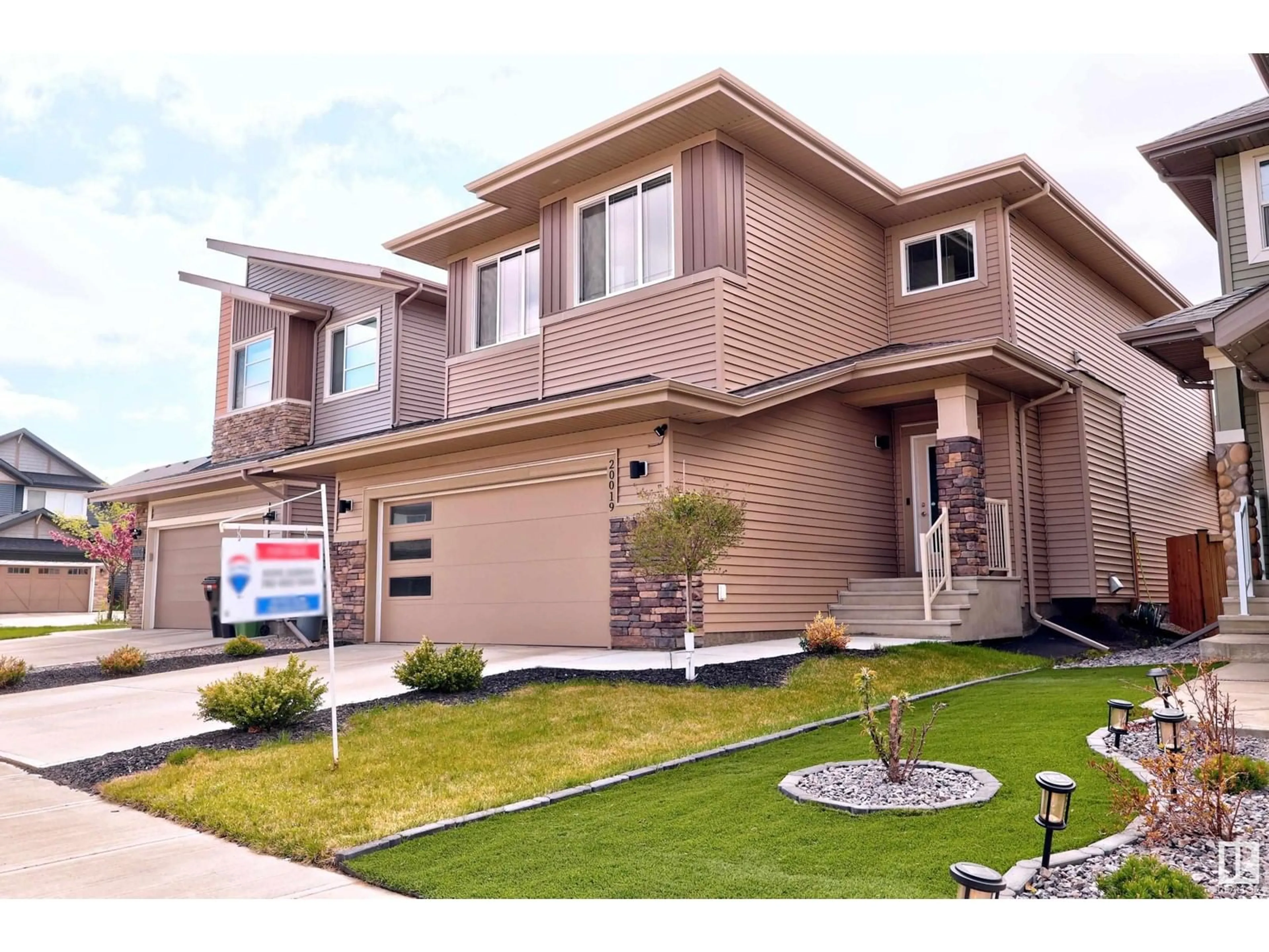 Home with vinyl exterior material, street for NW - 20019 29 AV, Edmonton Alberta T6M0W8