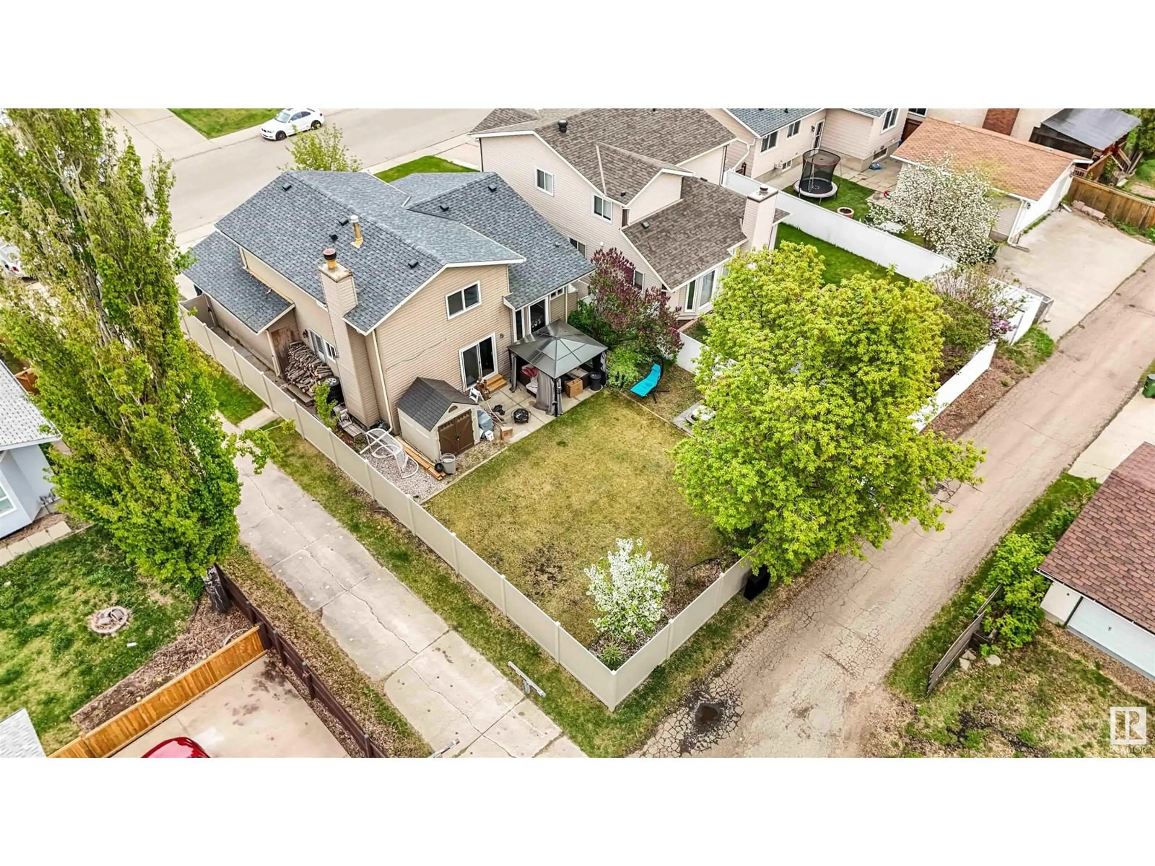 A pic from outside/outdoor area/front of a property/back of a property/a pic from drone, street for NW - 8319 152B AV, Edmonton Alberta T5E6G1