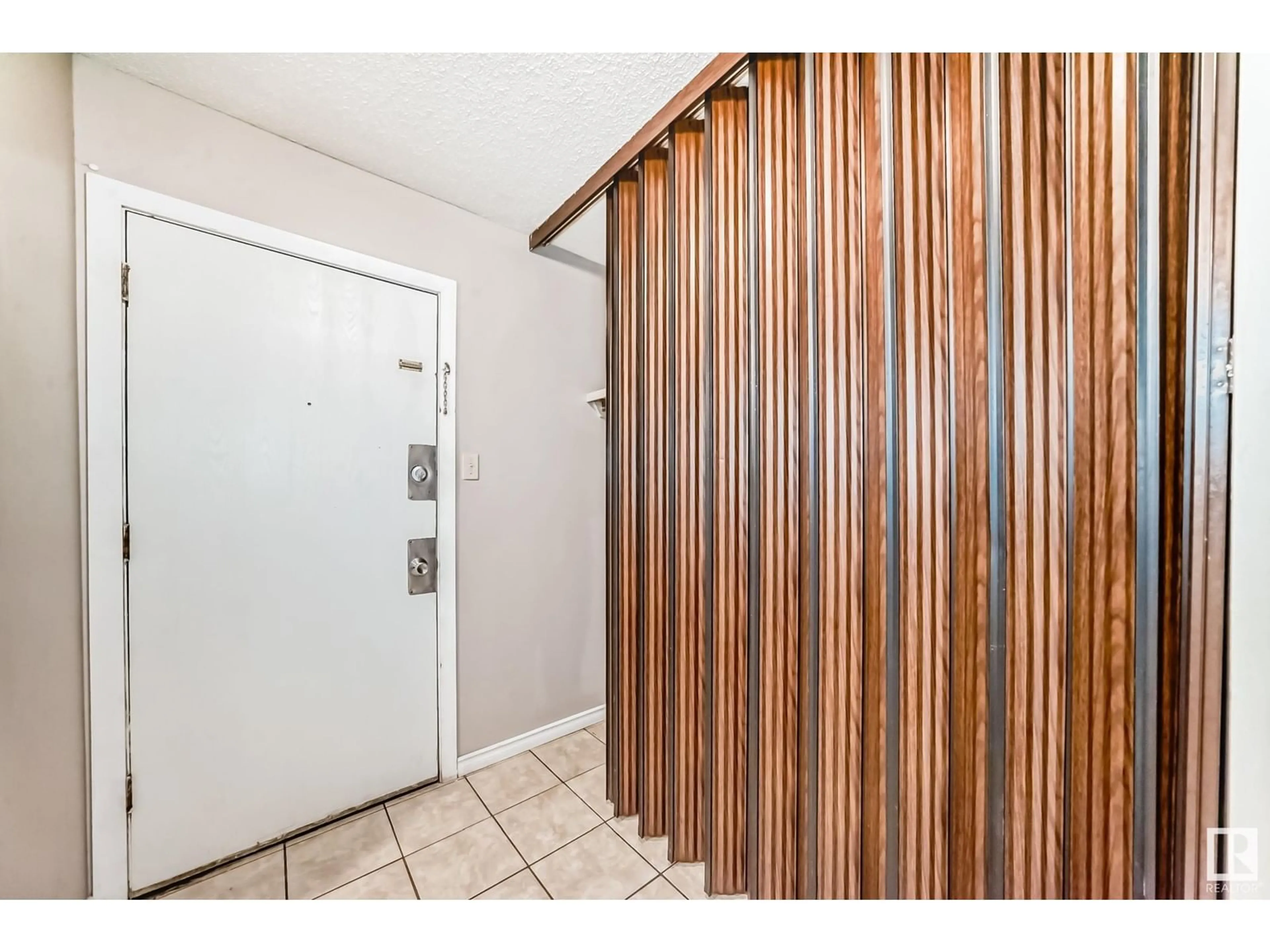 Indoor entryway for #107 - 10023 164 ST NW, Edmonton Alberta T5P4L4