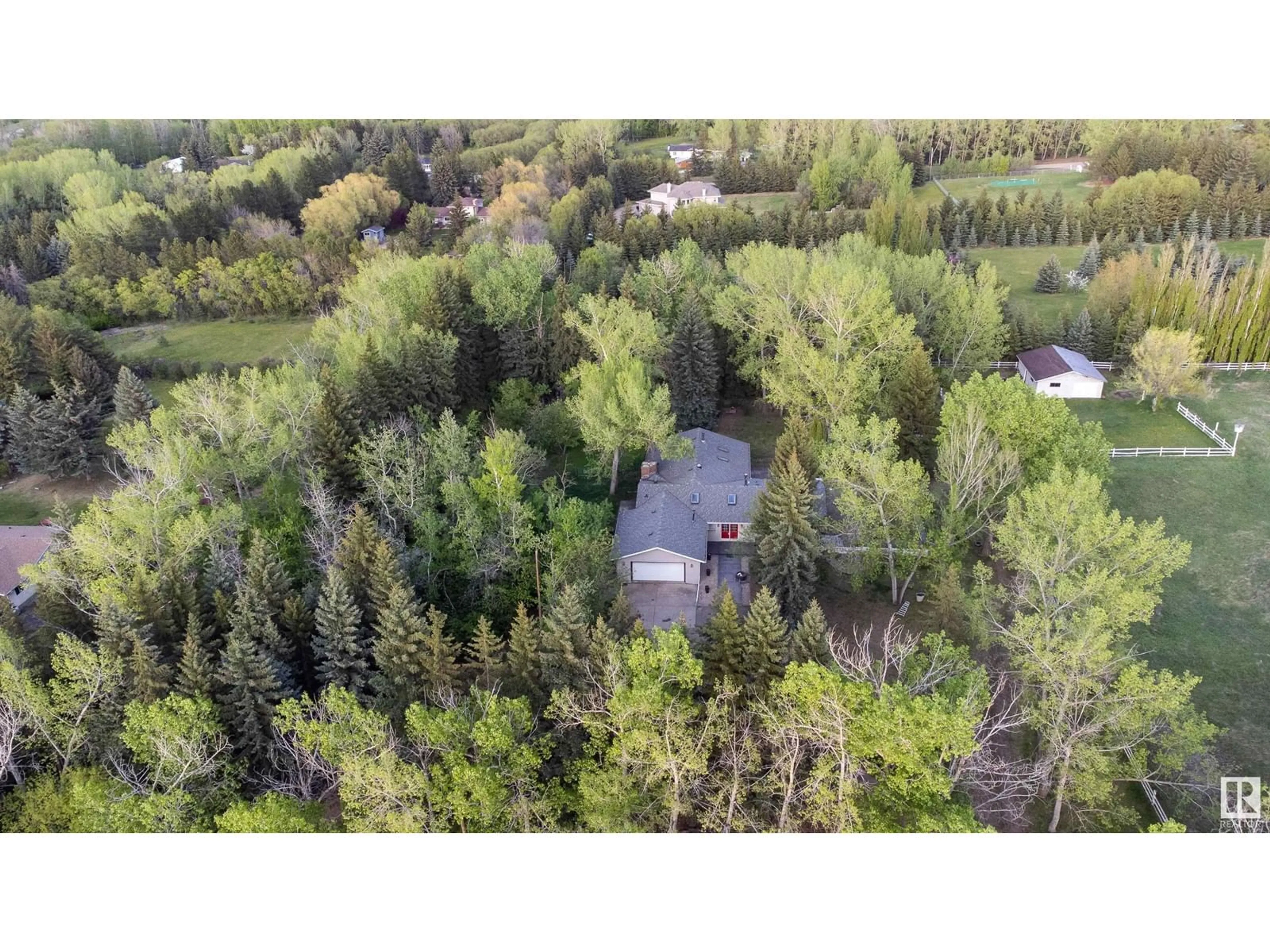 A pic from outside/outdoor area/front of a property/back of a property/a pic from drone, forest/trees view for 52552 224 - 134 RANGE ROAD ROAD, Rural Strathcona County Alberta T8A4R7