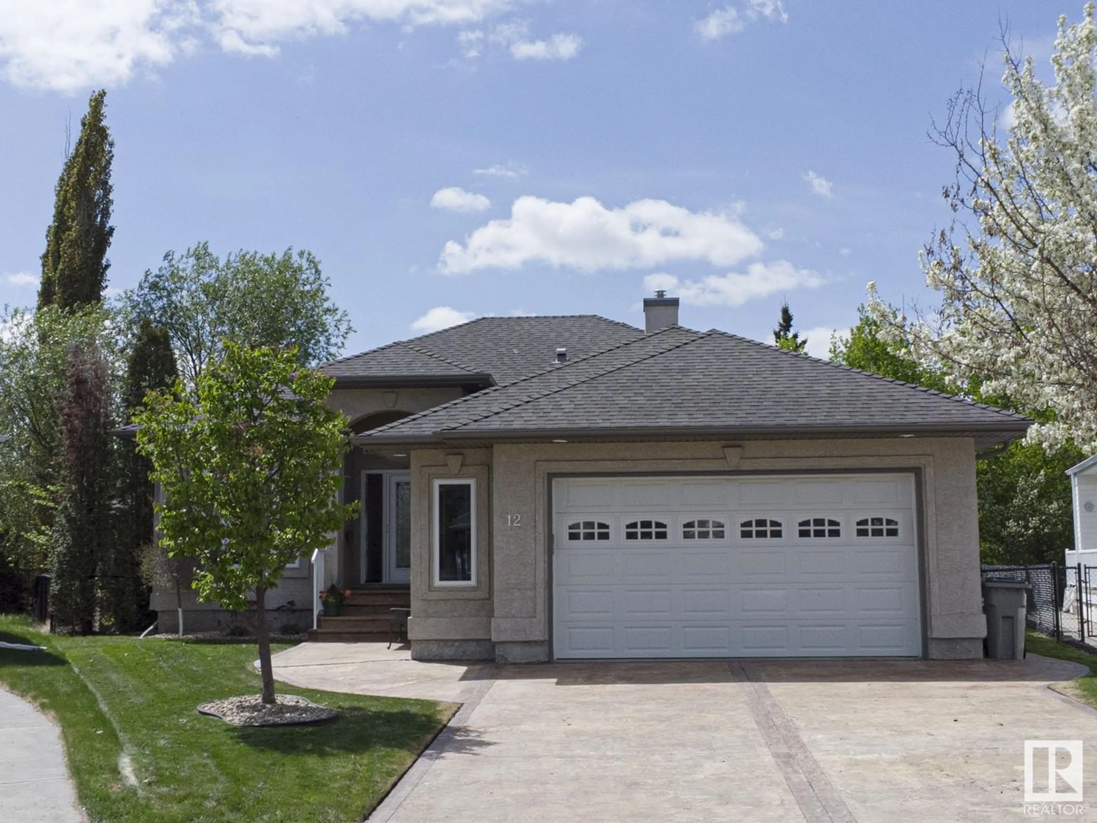 Home with vinyl exterior material, street for 12 COUNTRY CLUB PL, Beaumont Alberta T4X1P8