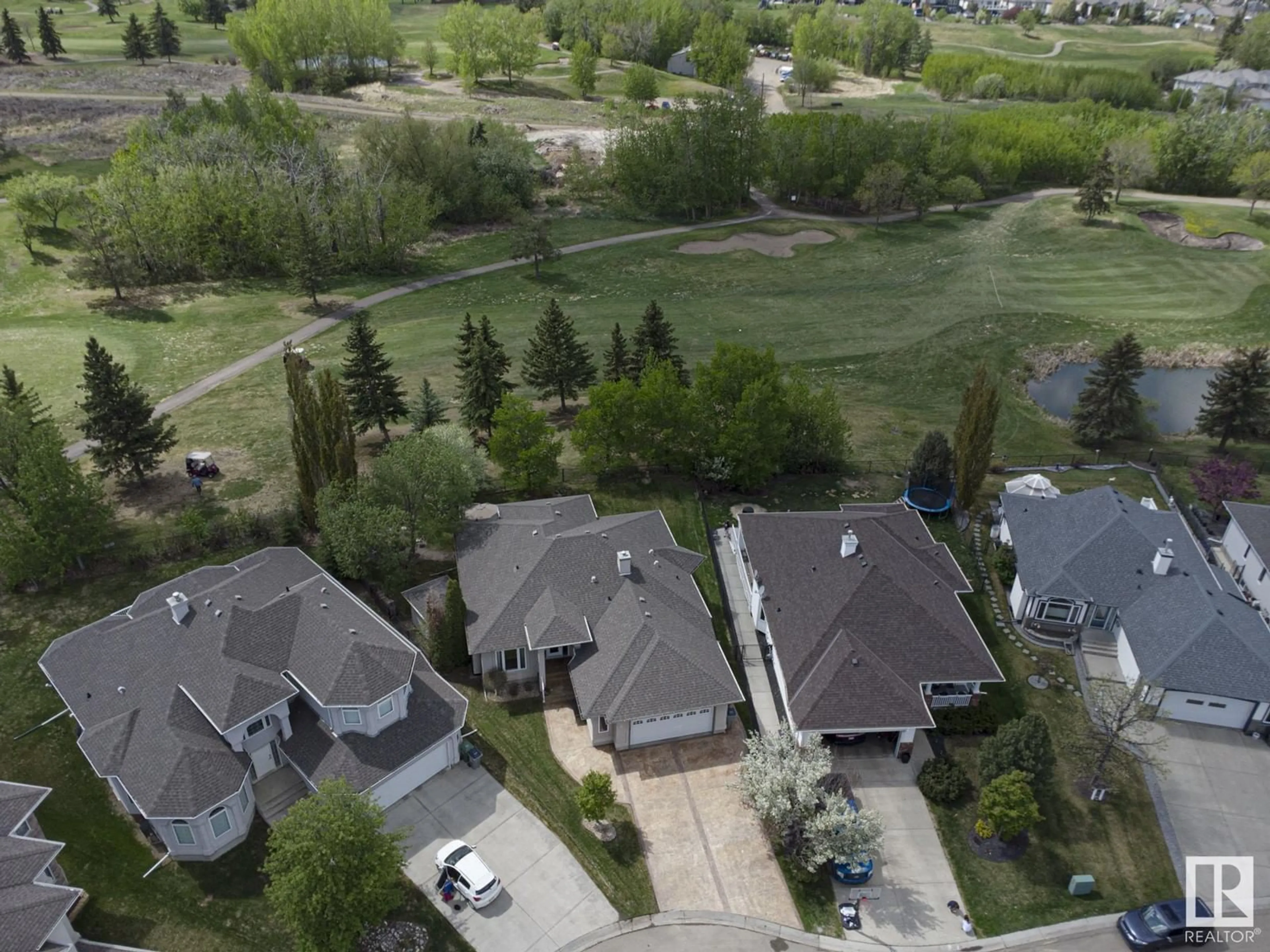 A pic from outside/outdoor area/front of a property/back of a property/a pic from drone, street for 12 COUNTRY CLUB PL, Beaumont Alberta T4X1P8