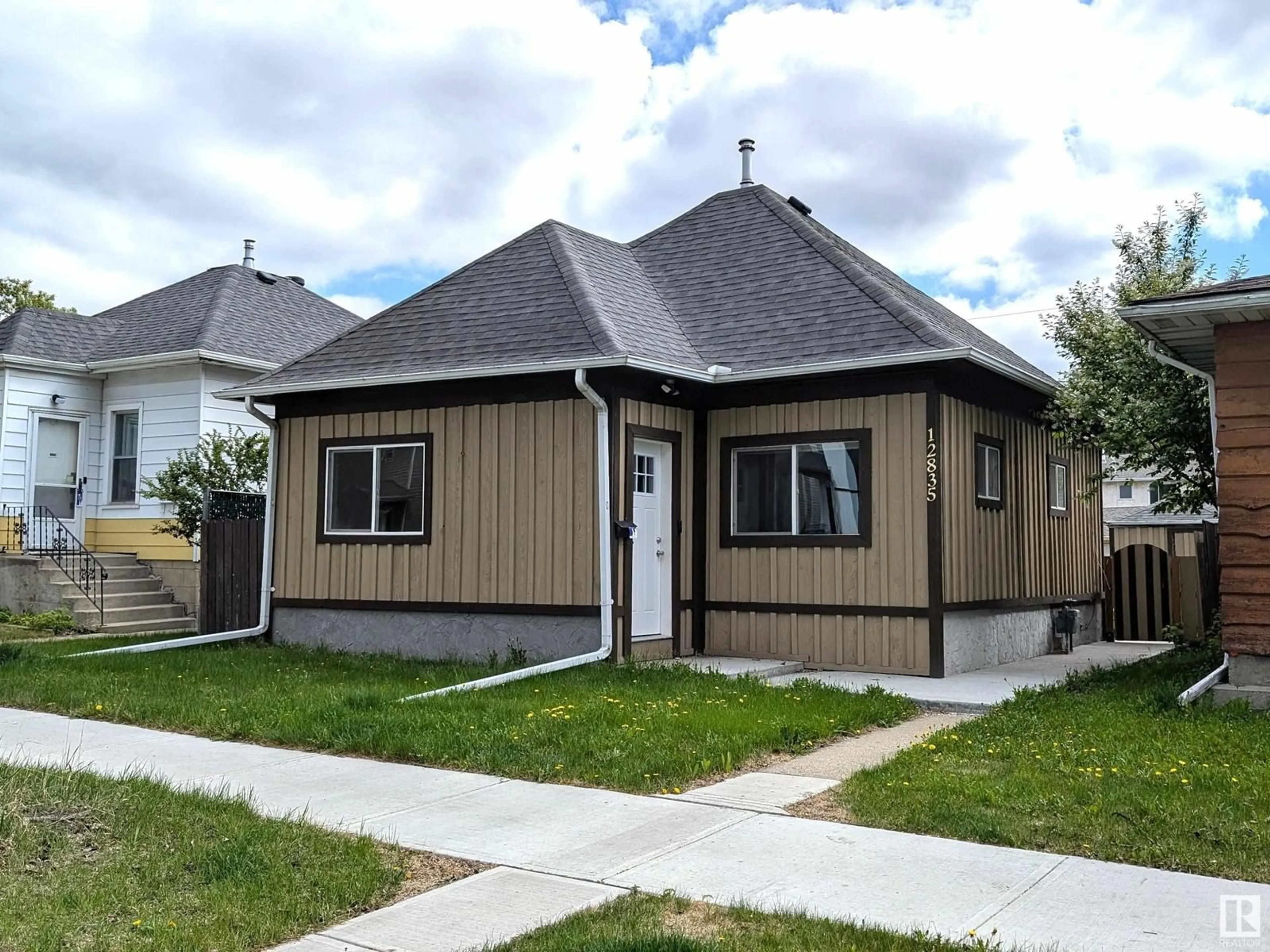 Home with vinyl exterior material, street for NW - 12835 121 ST, Edmonton Alberta T5L0B1