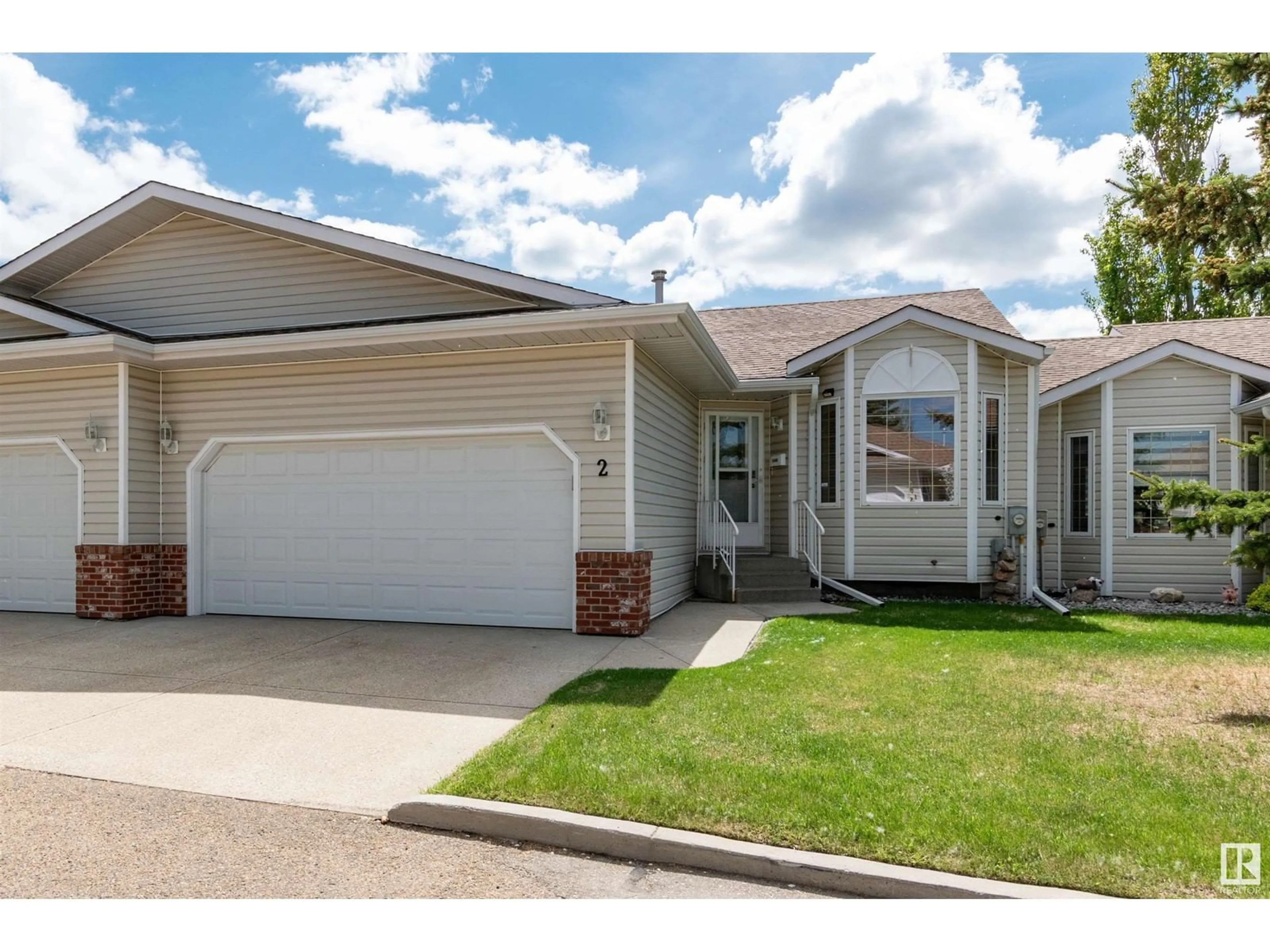 Home with vinyl exterior material, street for 7 - 2 CRANFORD WY, Sherwood Park Alberta T8H5W5