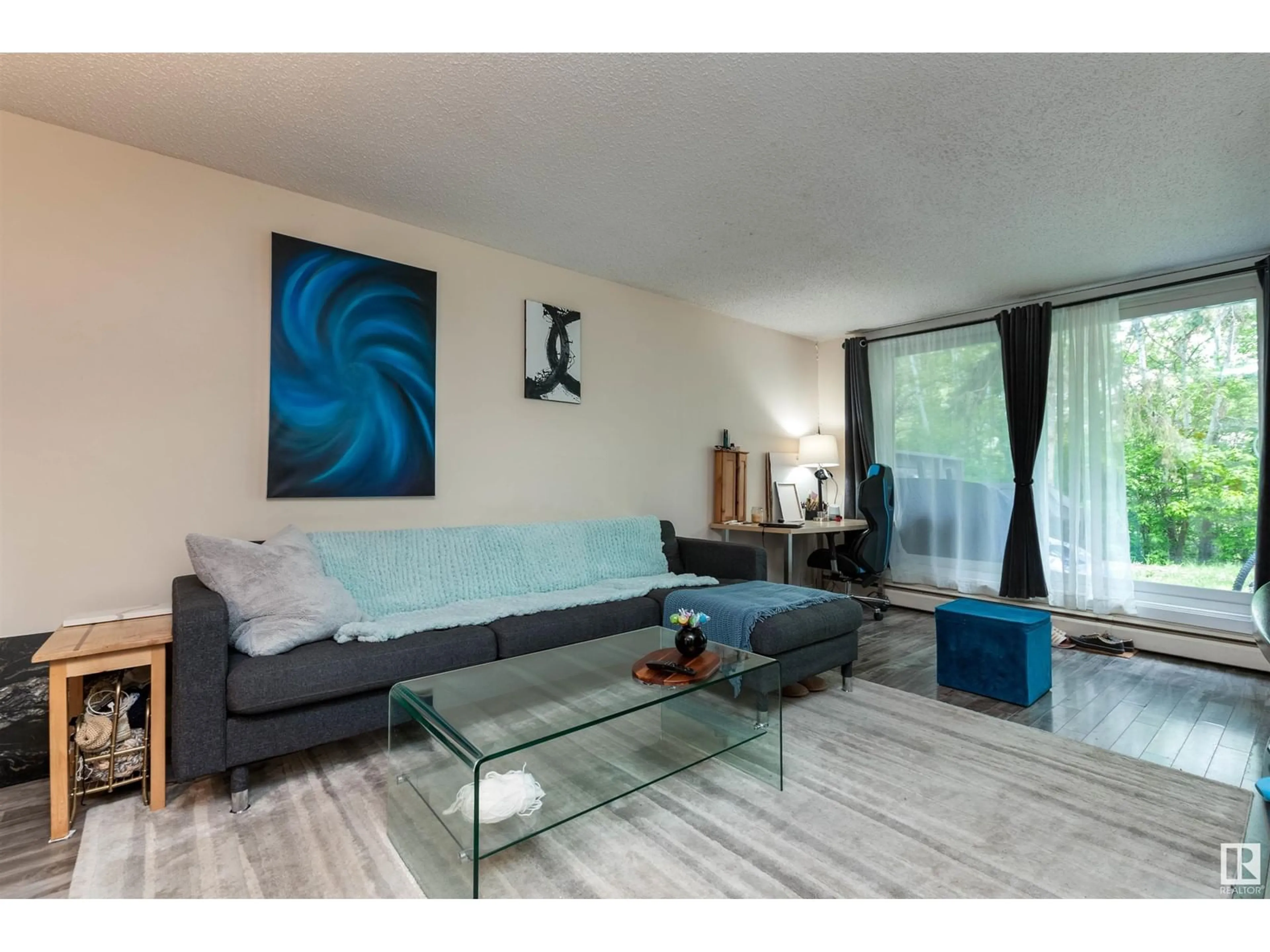 Living room with furniture, wood/laminate floor for 47 - 103 STURGEON RD, St. Albert Alberta T8N0E8