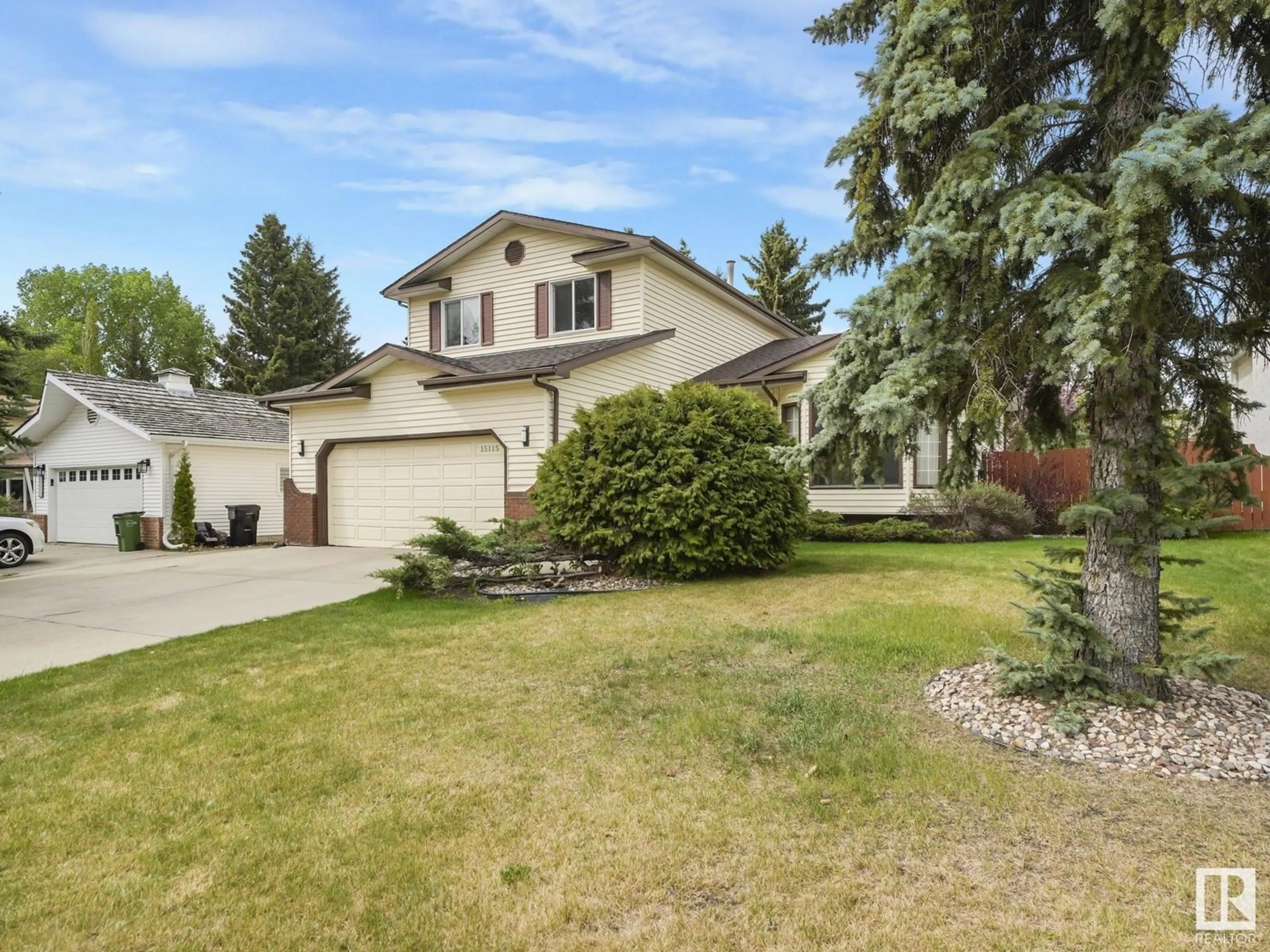 Home with vinyl exterior material, street for 15115 RAMSAY CR, Edmonton Alberta T6H5R1
