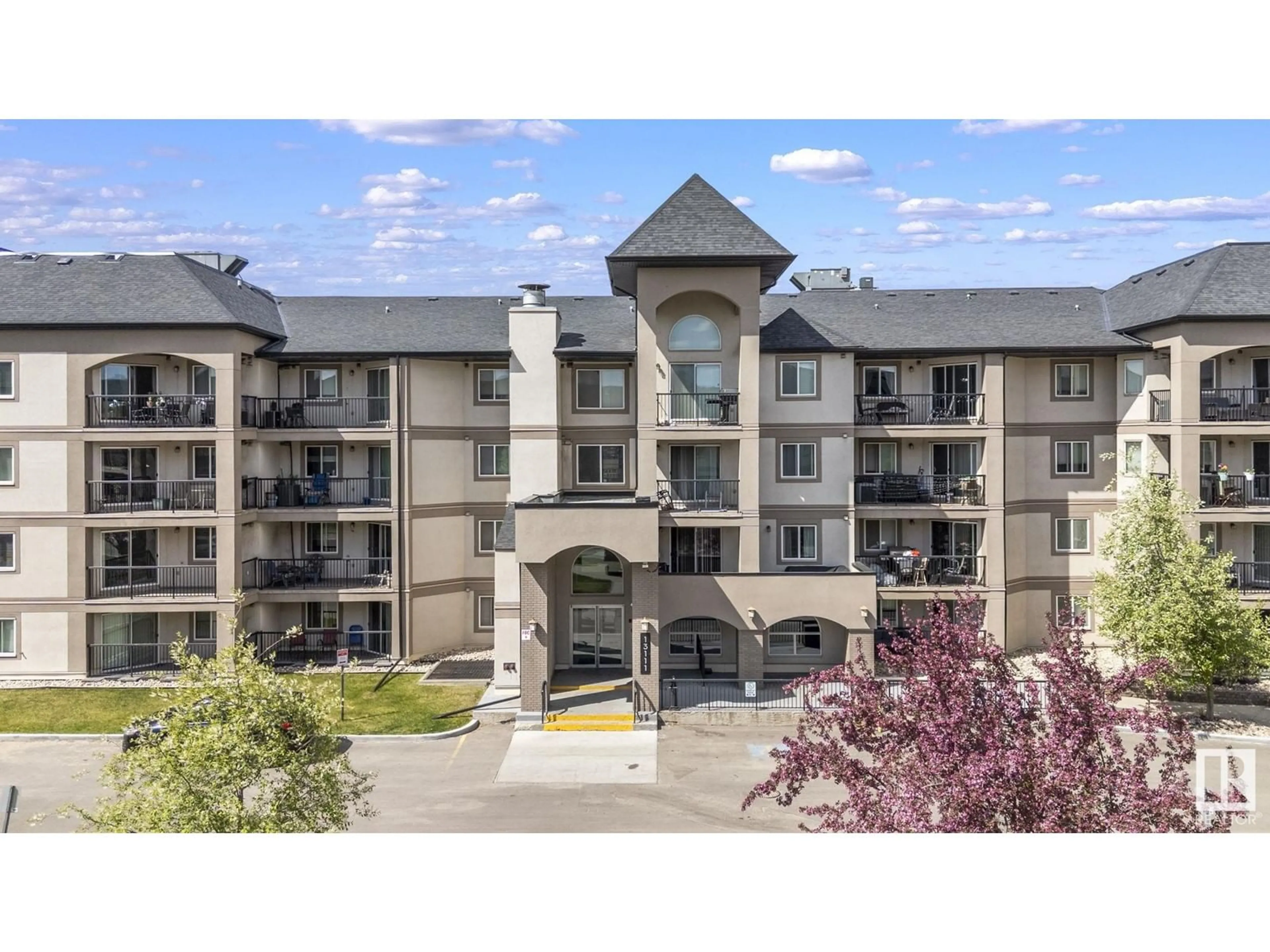 A pic from outside/outdoor area/front of a property/back of a property/a pic from drone, mountain view for 310 - 13111 140 AV, Edmonton Alberta T6V0B1