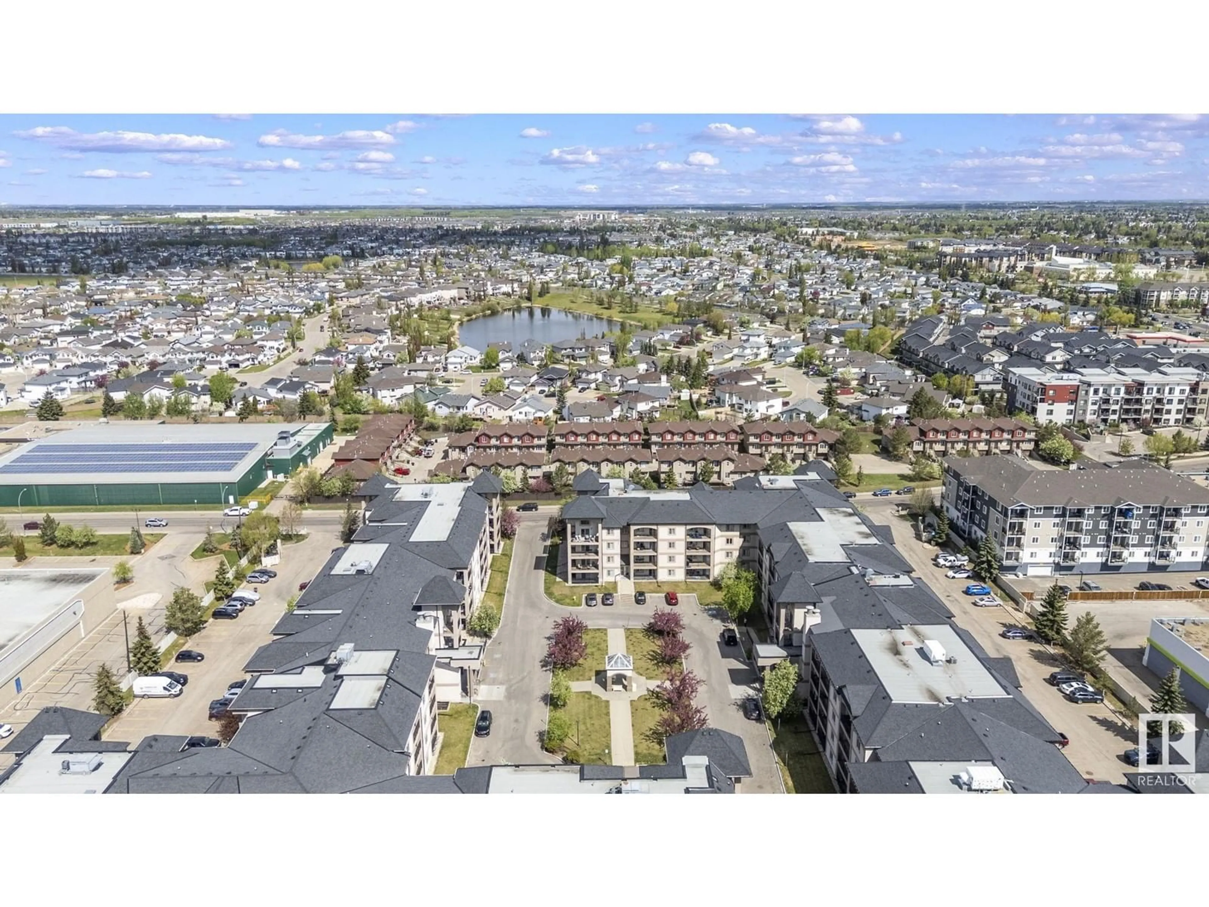 A pic from outside/outdoor area/front of a property/back of a property/a pic from drone, unknown for 310 - 13111 140 AV, Edmonton Alberta T6V0B1
