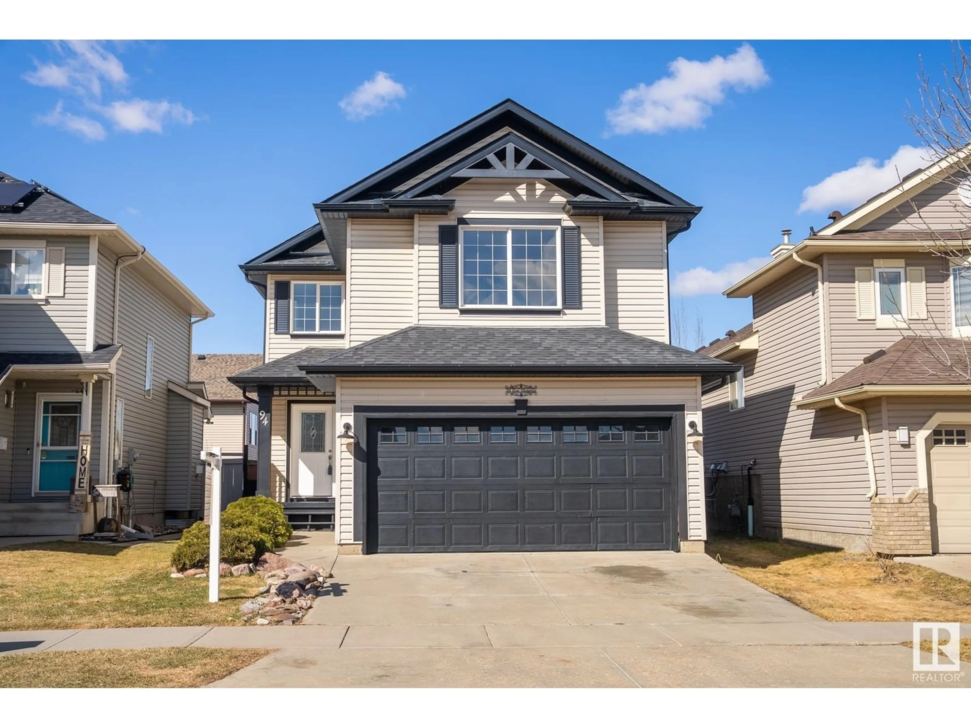 Home with vinyl exterior material, street for 94 RUE MONETTE, Beaumont Alberta T4X1T1