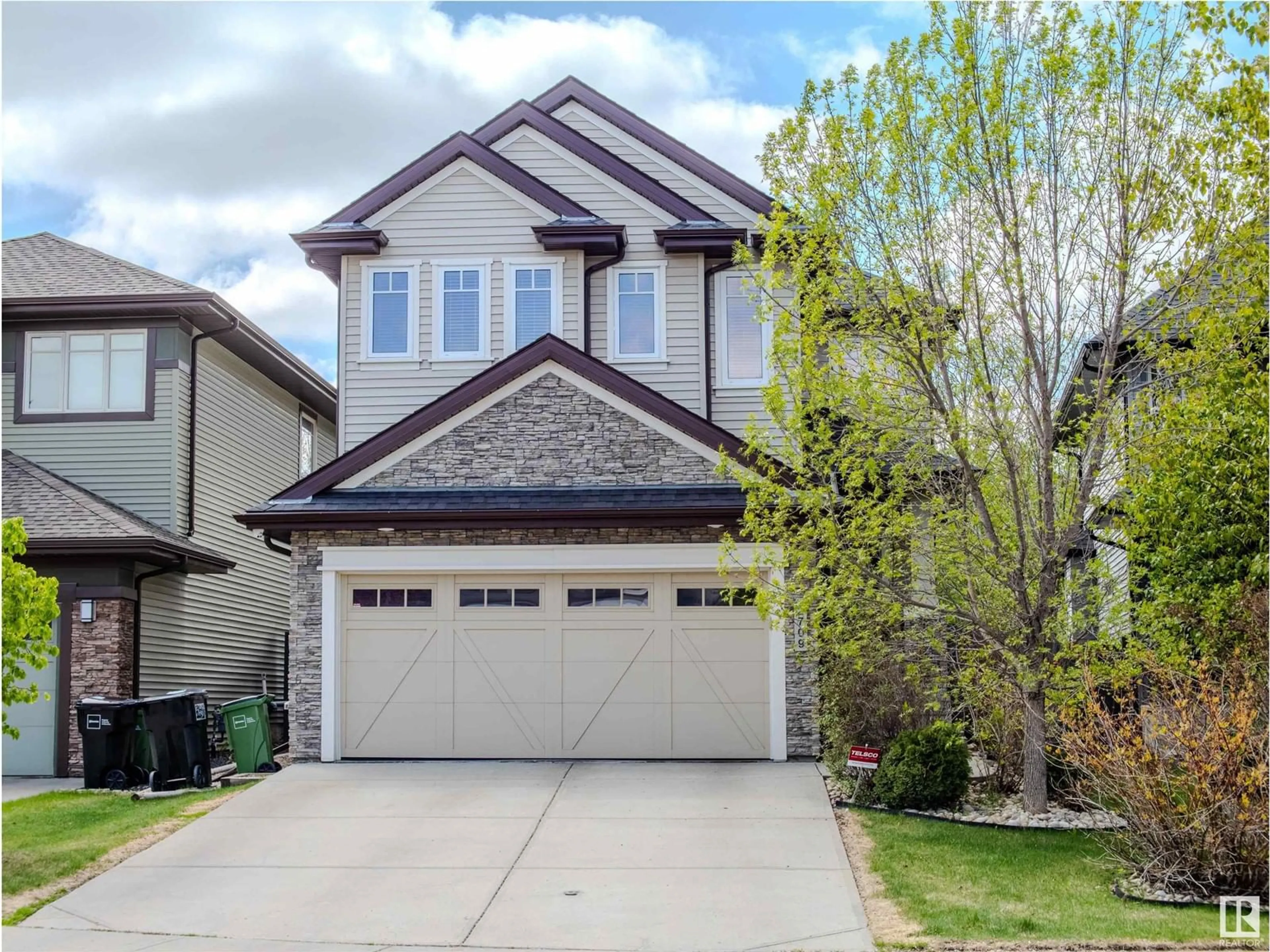 Home with vinyl exterior material, street for 2709 ANDERSON CR, Edmonton Alberta T6W0K5