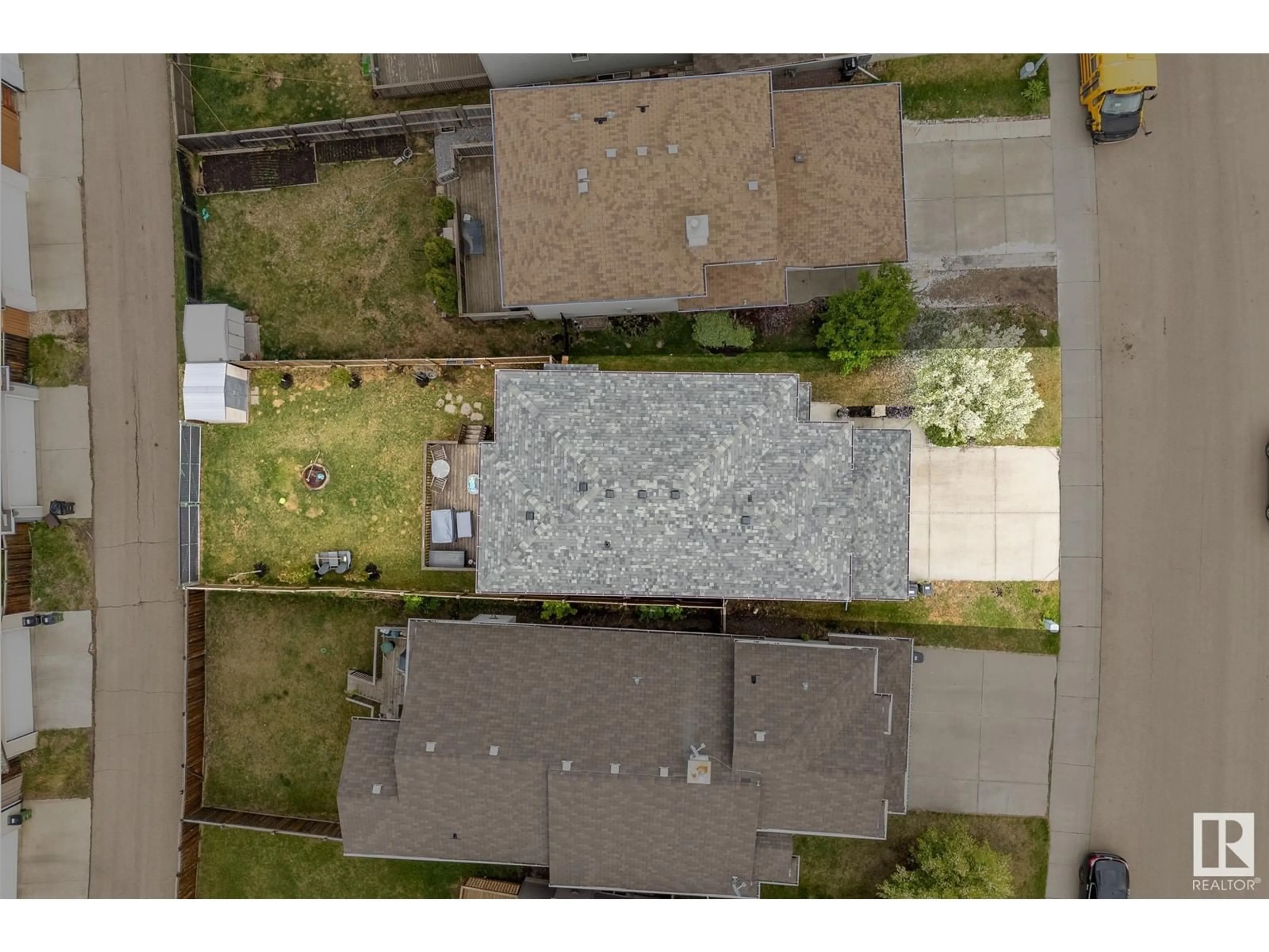 A pic from outside/outdoor area/front of a property/back of a property/a pic from drone, street for 4644 156 AV, Edmonton Alberta T5Y3L9