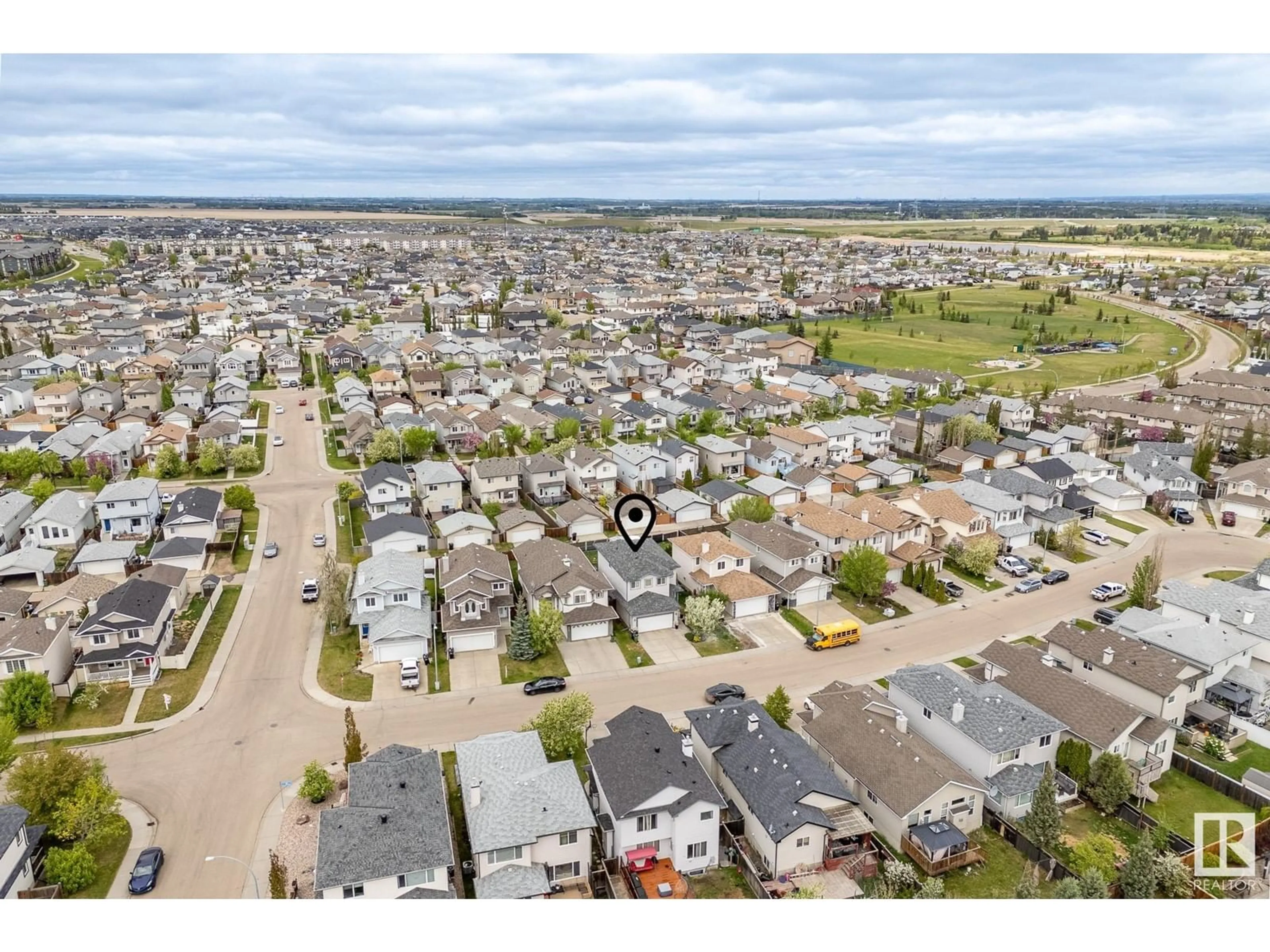 A pic from outside/outdoor area/front of a property/back of a property/a pic from drone, street for 4644 156 AV, Edmonton Alberta T5Y3L9