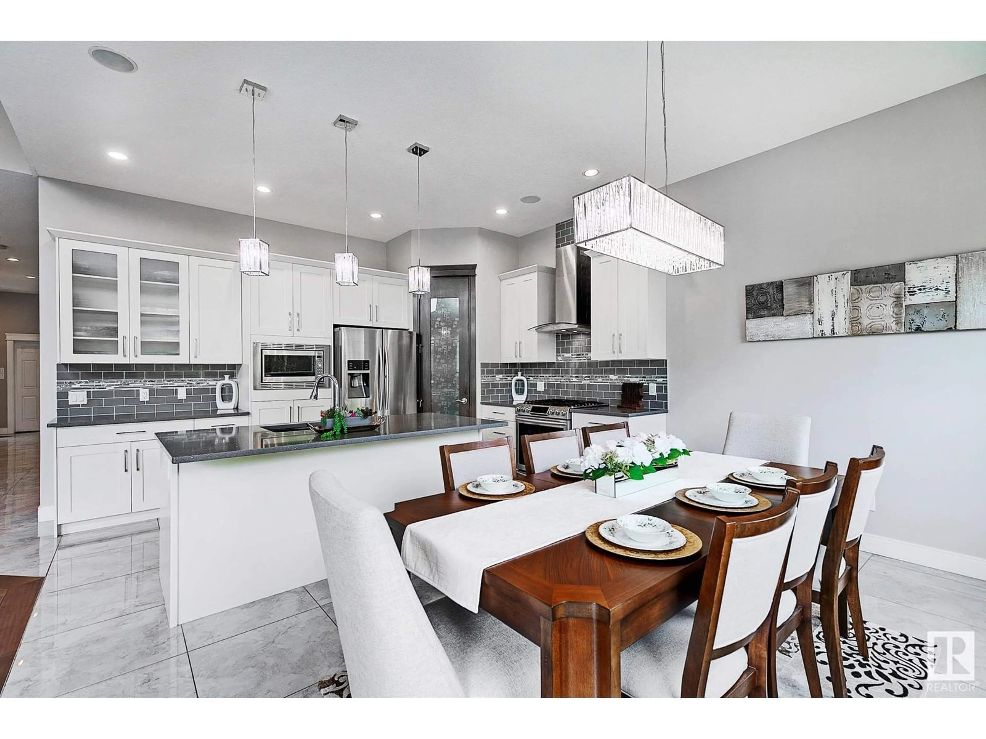 Open concept kitchen, ceramic/tile floor for 3365 CHICKADEE DR, Edmonton Alberta T5S0K9