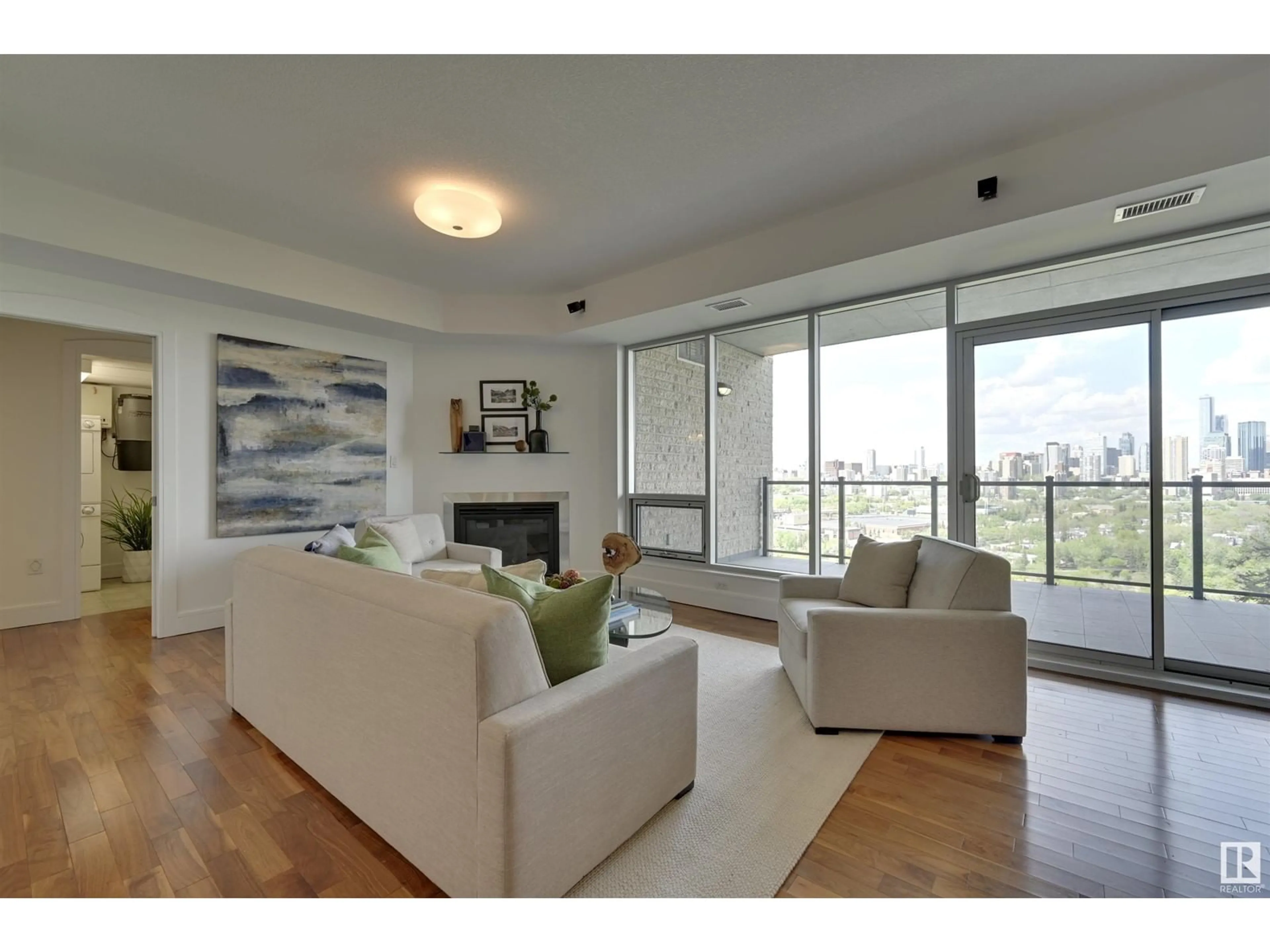 Living room with furniture, wood/laminate floor for #503 - 10035 SASKATCHEWAN DR, Edmonton Alberta T6E4R4